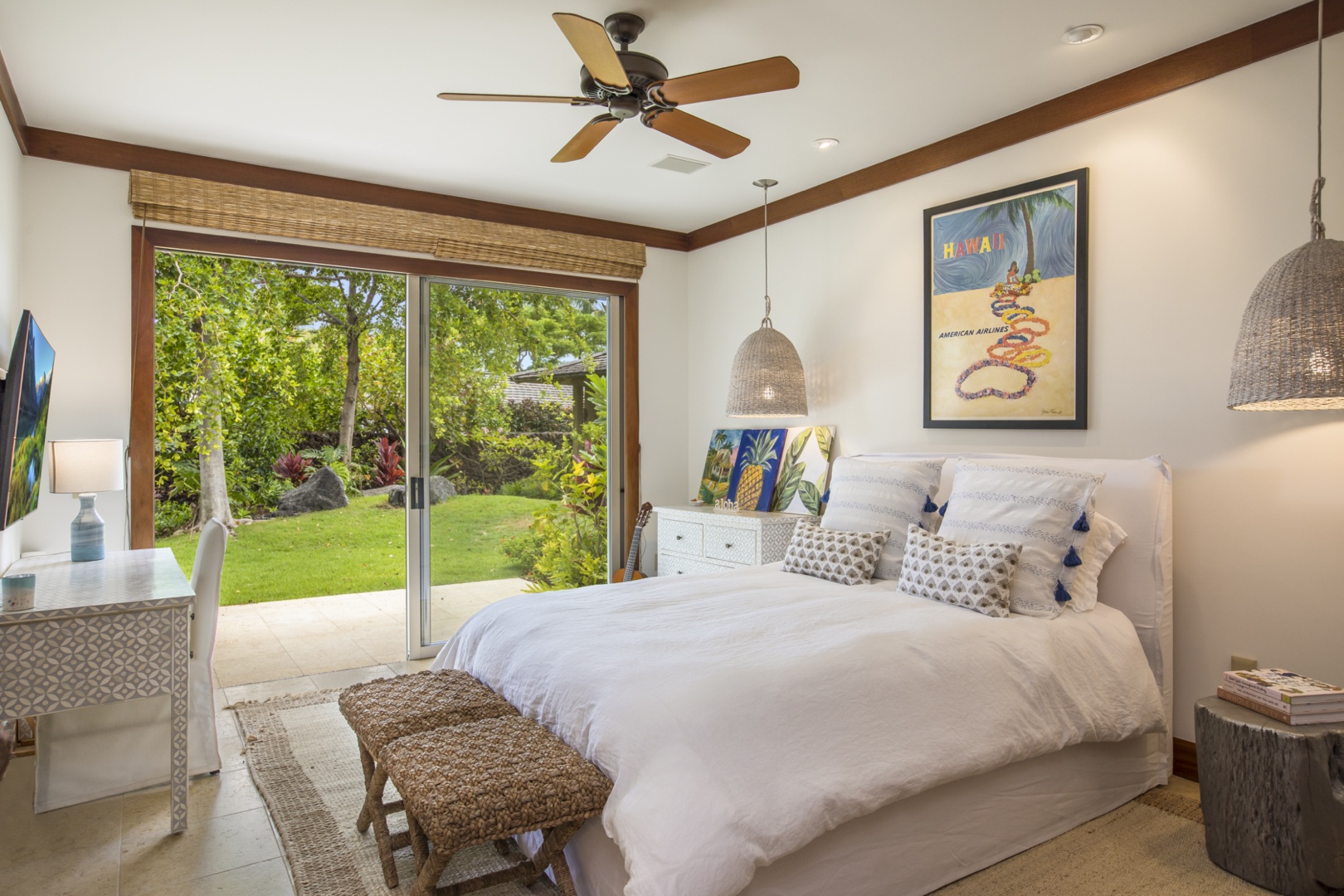 Kailua Kona Vacation Rentals, 4BD Kahikole Street (218) Estate Home at Four Seasons Resort at Hualalai - Second bedroom with a queen bed, wall-mounted television, private lanai & en suite bath