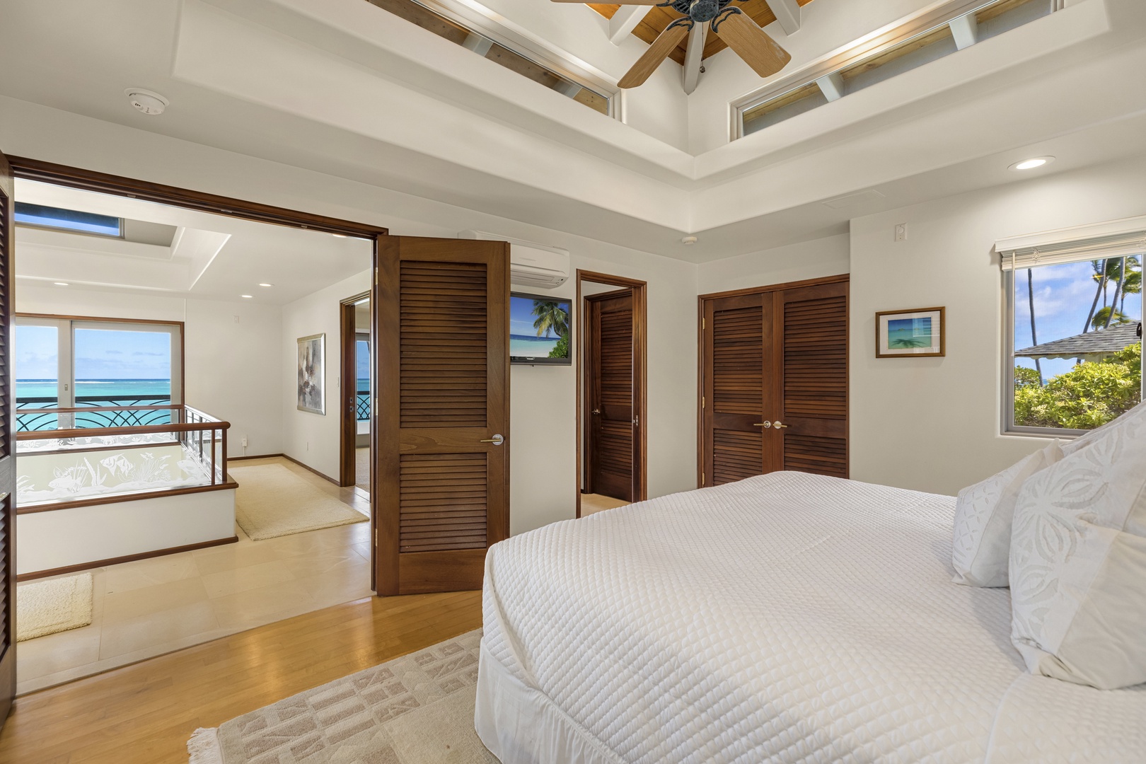 Kailua Vacation Rentals, Mokulua Sunrise - All bedrooms come with air conditioning for optimal temperature control. There is also a laundry room including an in-unit washer and dryer as well as a utility sink and cabinet storage for convenience.