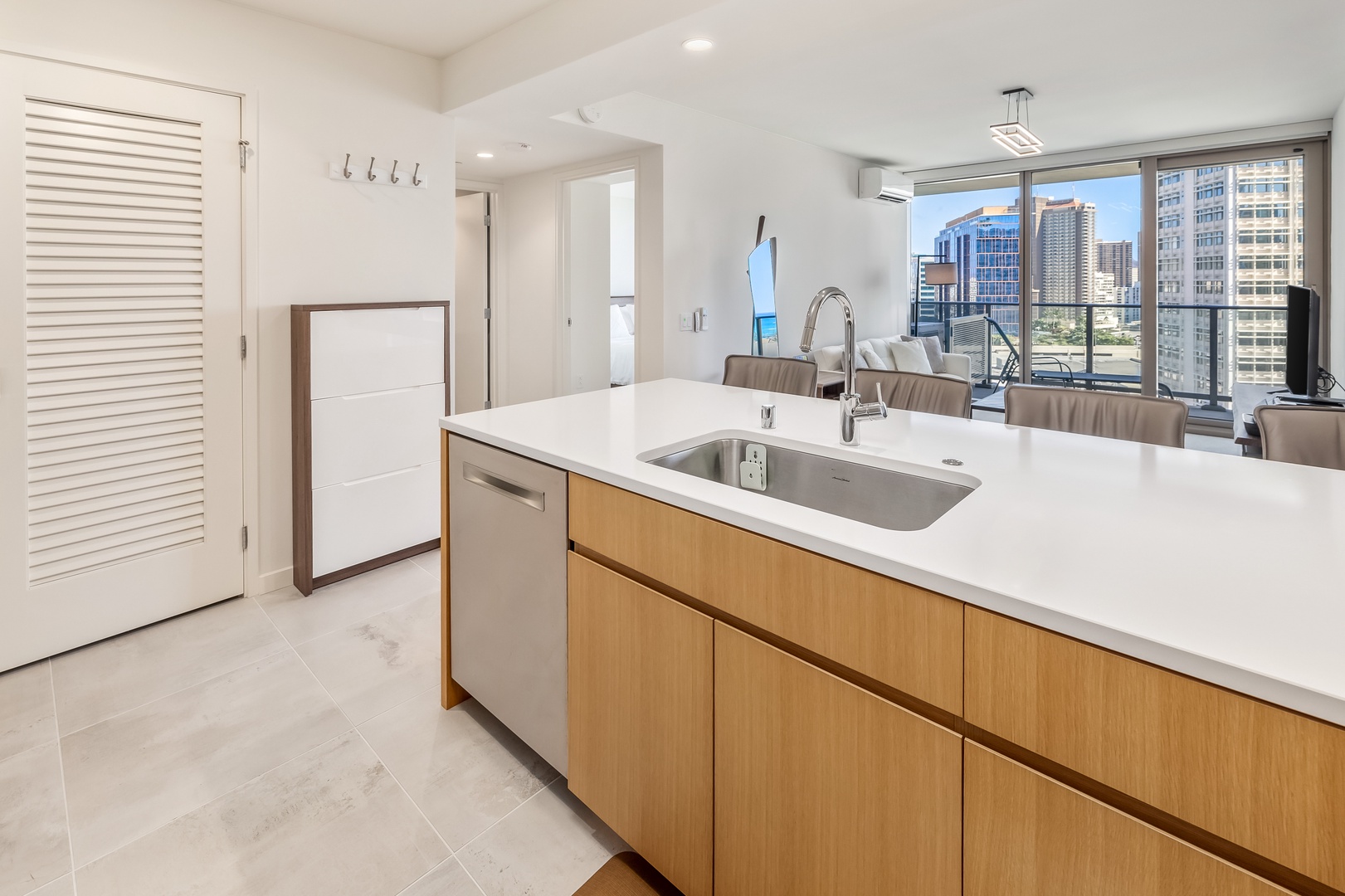 Honolulu Vacation Rentals, Sky Ala Moana #1701 - Spacious kitchen island with a deep sink and dishwasher, perfect for meal prep and entertaining.