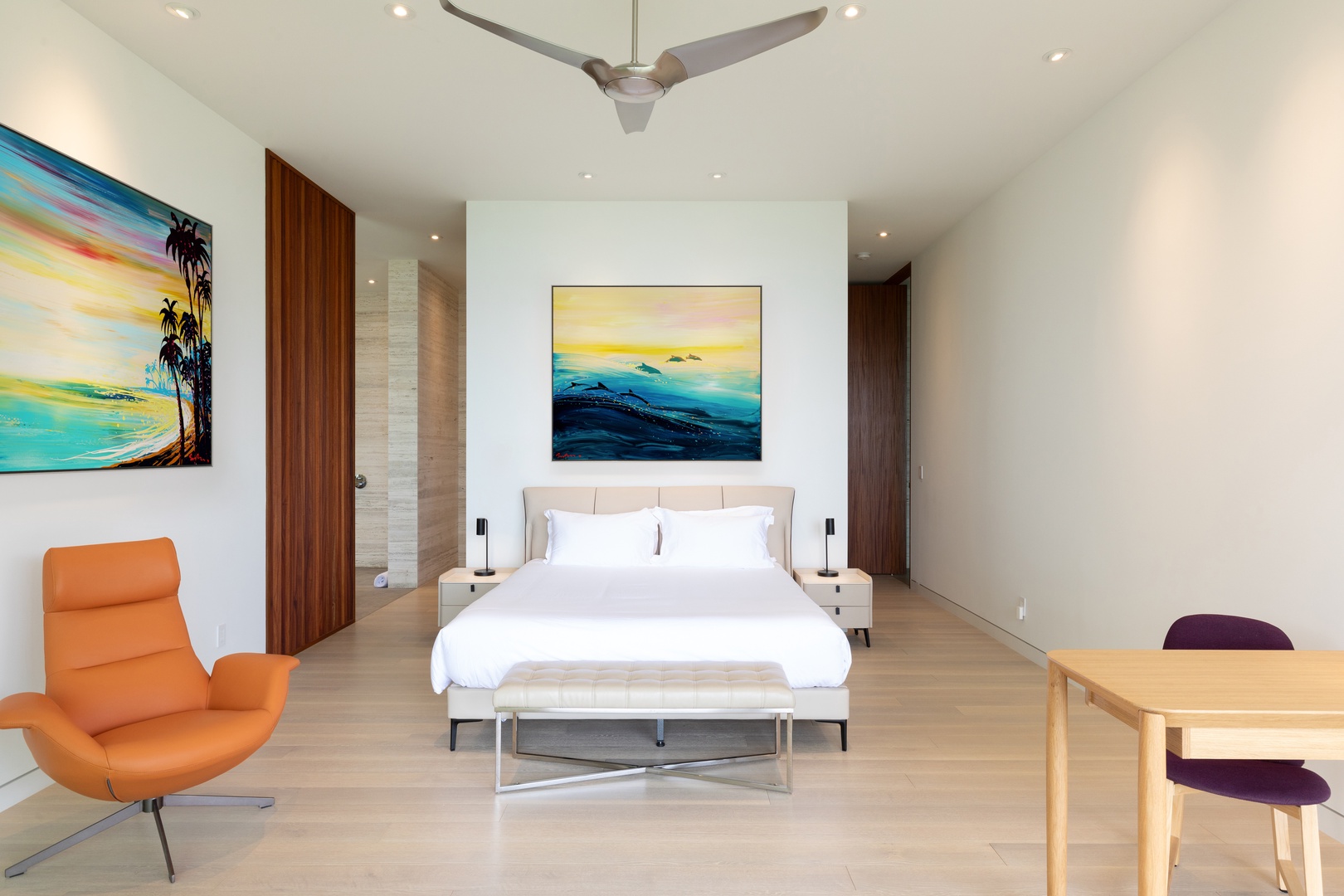 Kamuela Vacation Rentals, Puako’s Ocean Edge Modern Estate - Experience comfort in this sleek primary bedroom, featuring a king-sized bed with natural wood accents for a peaceful retreat.