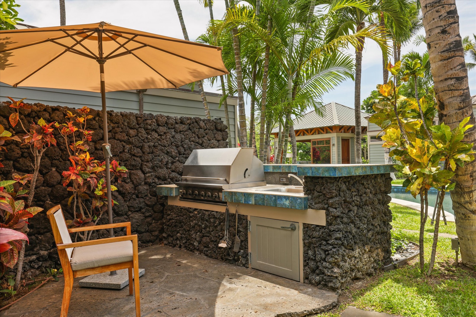 Kamuela Vacation Rentals, 3BD Na Hale 3 at Pauoa Beach Club at Mauna Lani Resort - Grill dinner while the group circles up outside.