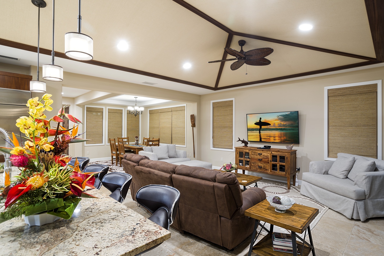 Kailua Kona Vacation Rentals, Kona Blue Vacations Holua Kai - The seamless flow between the living space, the dining area, and the open-concept kitchen creates an ideal setting for togetherness during your stay in paradise.