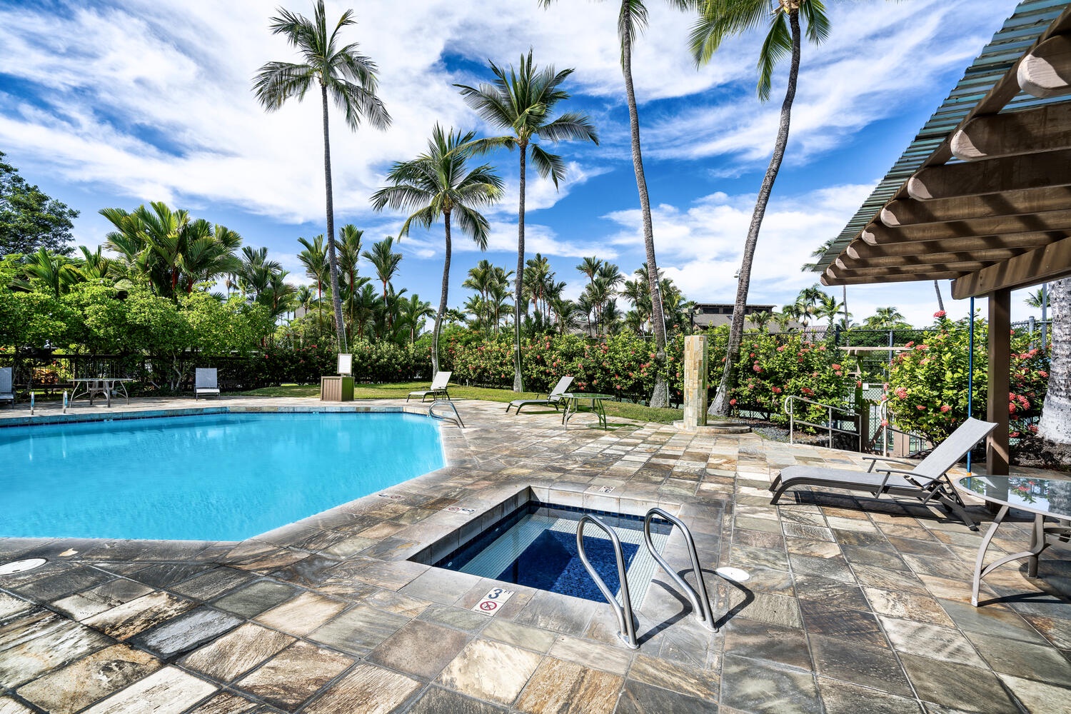 Kailua Kona Vacation Rentals, Kanaloa at Kona 3303 - Relax in the hot tub surrounded by tropical palms.