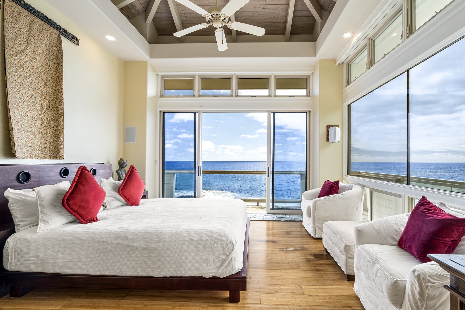 Kailua Kona Vacation Rentals, Ali'i Point #12 - Primary suite includes ocean-view seating area and access to a private balcony for tranquil mornings.