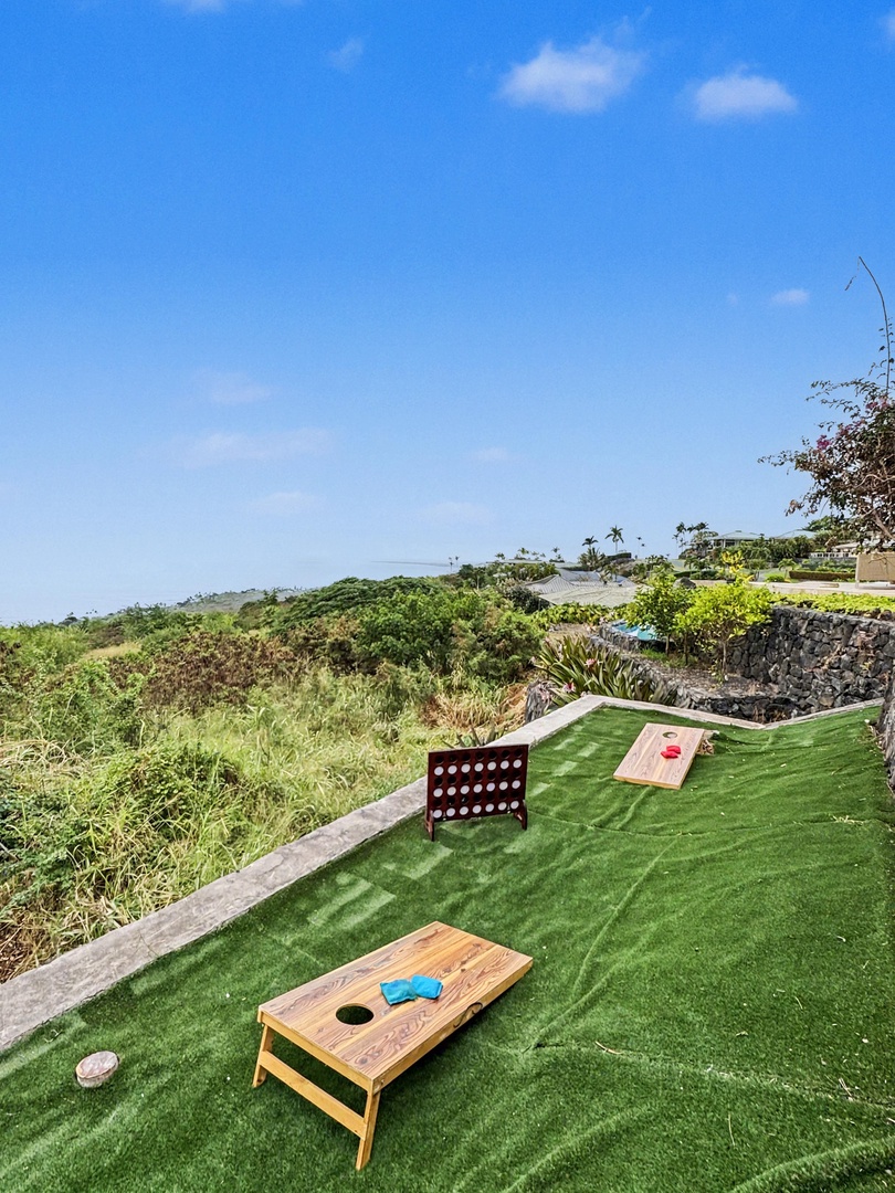 Kailua Kona Vacation Rentals, Hale Nai'a - Challenge friends to cornhole on your private lawn with stunning tropical coastline views stretching beyond.