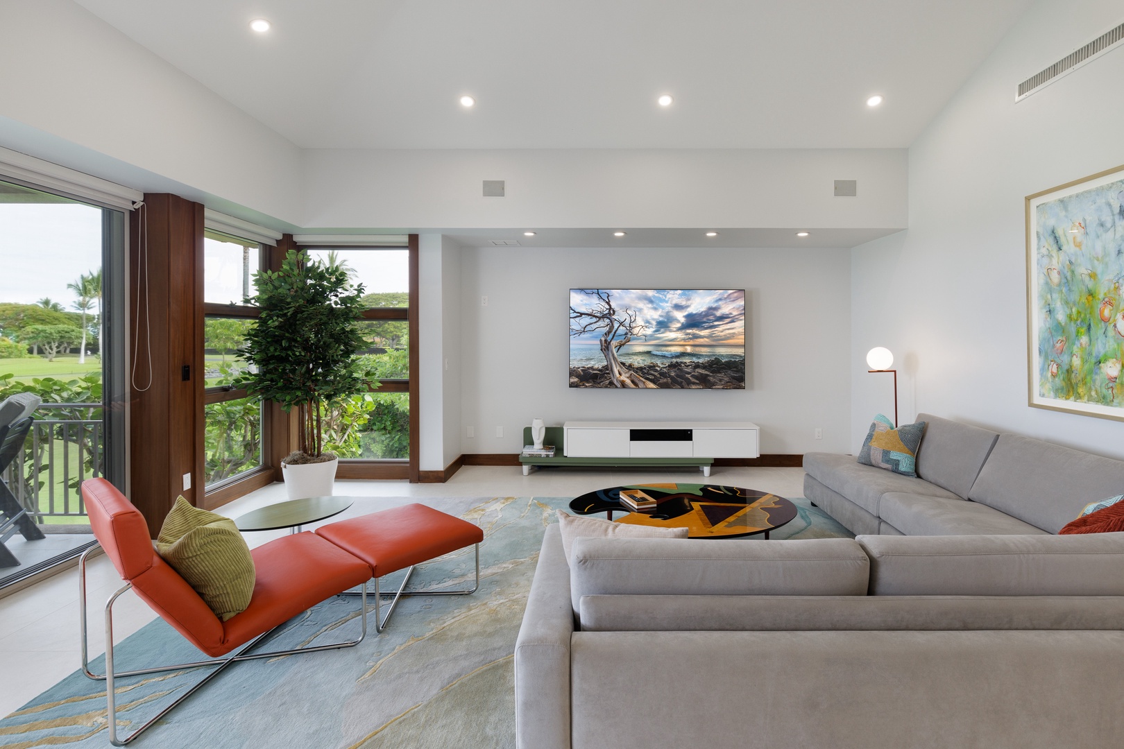 Kailua Kona Vacation Rentals, 3BD Fairways Villa (104A) at Four Seasons Resort at Hualalai - Bright and airy living area with a flat-screen TV.