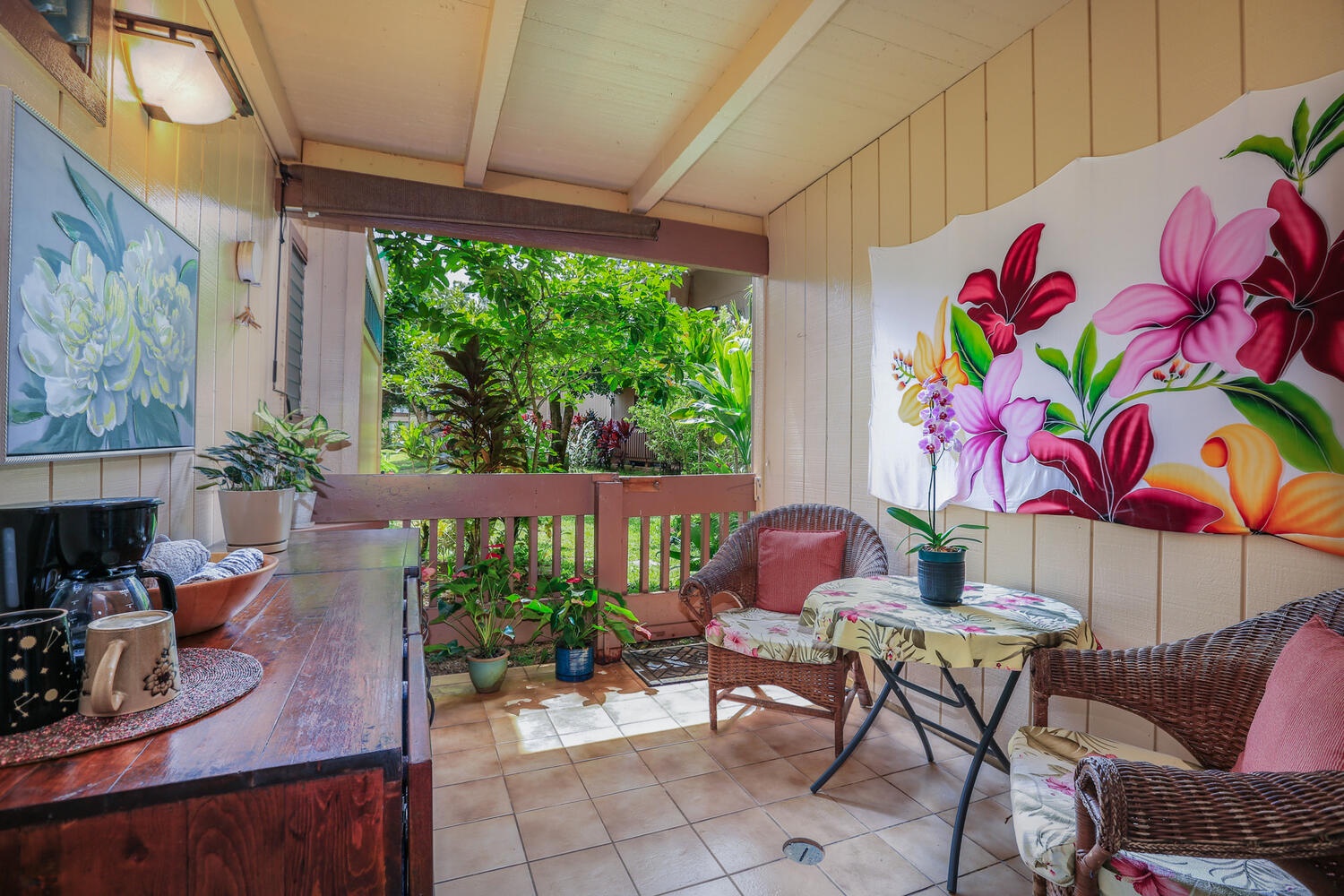 Princeville Vacation Rentals, Hideaway Haven Suite - Enjoy your morning coffee embraced by the soothing touch of nature on your private patio.