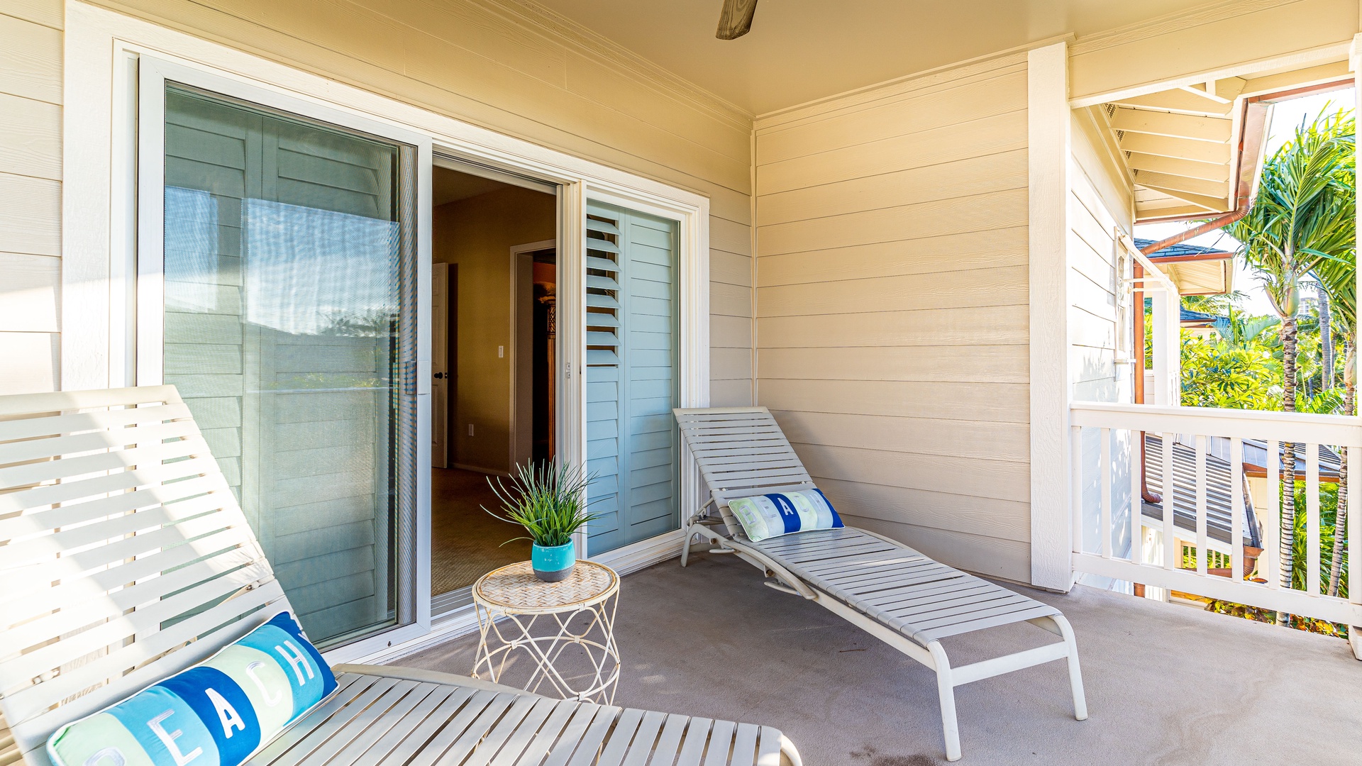 Kapolei Vacation Rentals, Coconut Plantation 1174-2 - Lounge chairs for relaxing on the lanai.