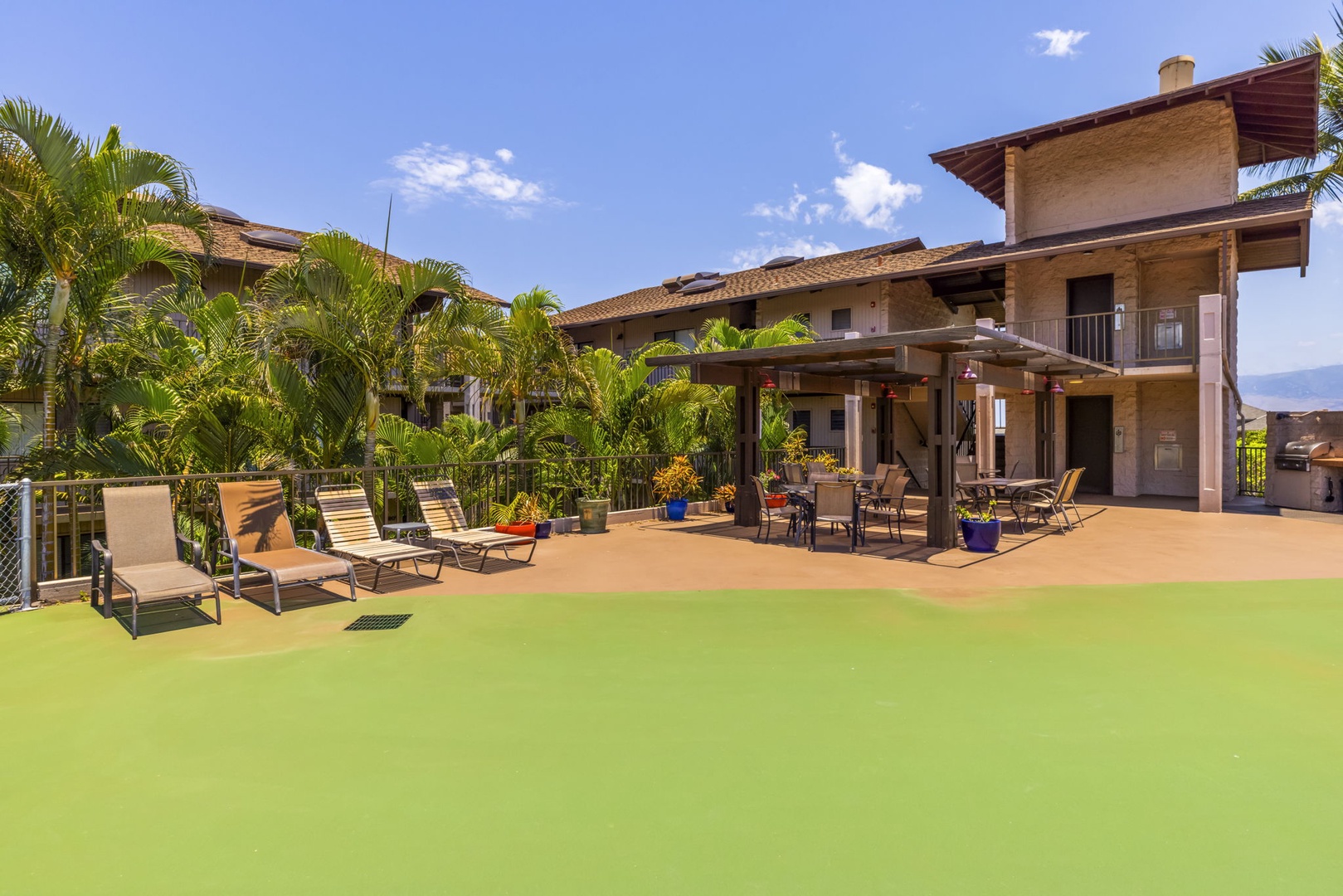 Kihei Vacation Rentals, Kihei Alii Kai C206 - Head up to the sundeck for loungers in the sun and tables under the pergola.