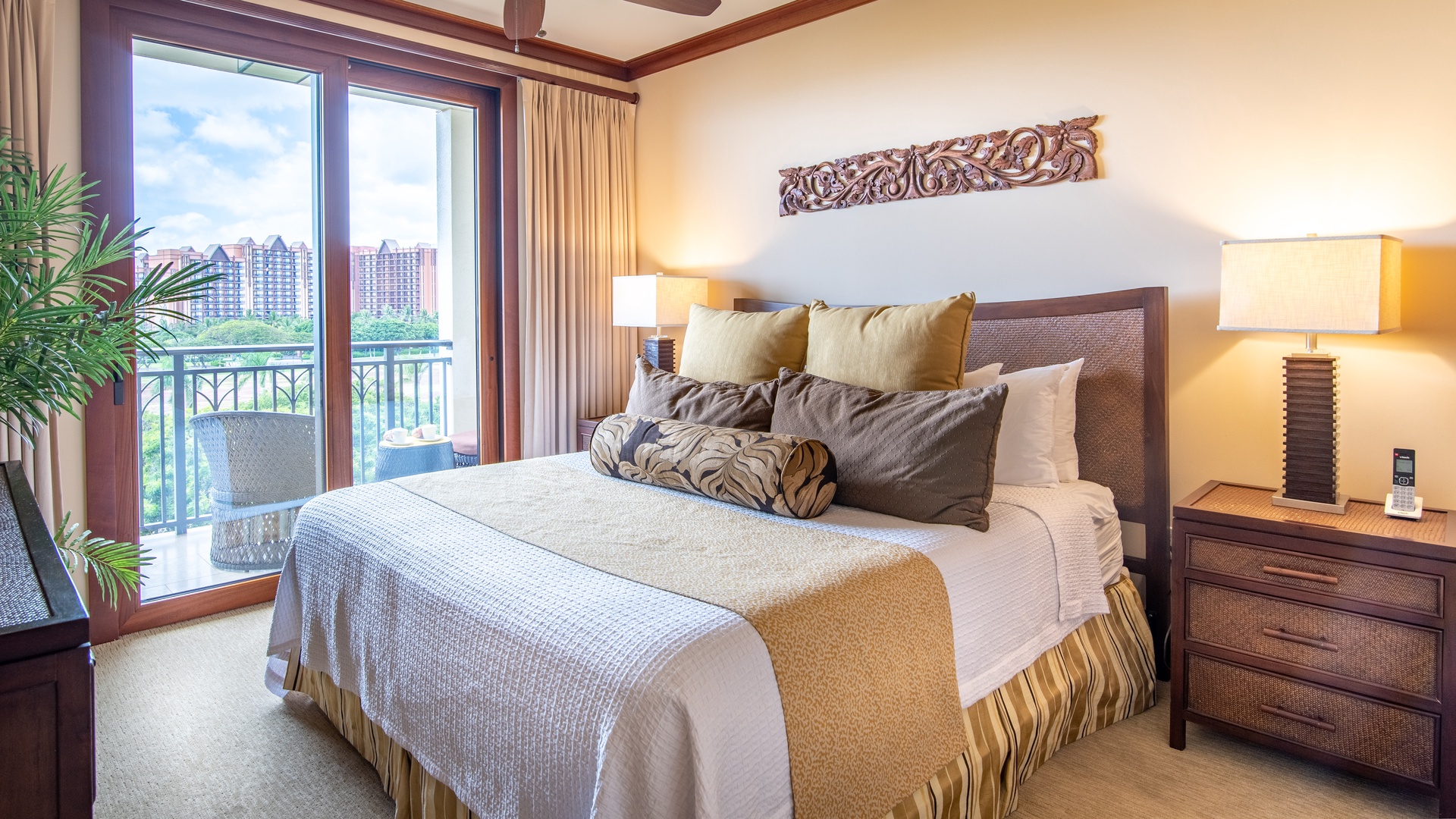 Kapolei Vacation Rentals, Ko Olina Beach Villas B608 - The primary guest bedroom has access to the lanai.