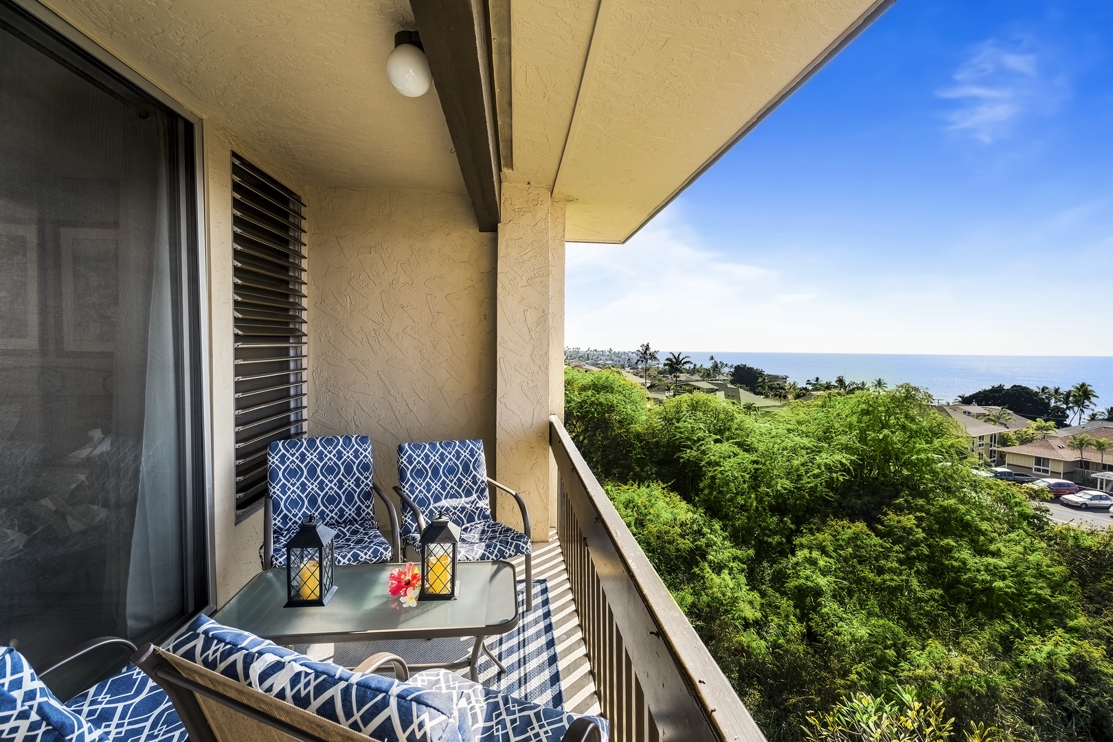 Kailua-Kona Vacation Rentals, Kona Mansions D231 - Primary bedroom Lanai, the perfect spot for your morning coffee