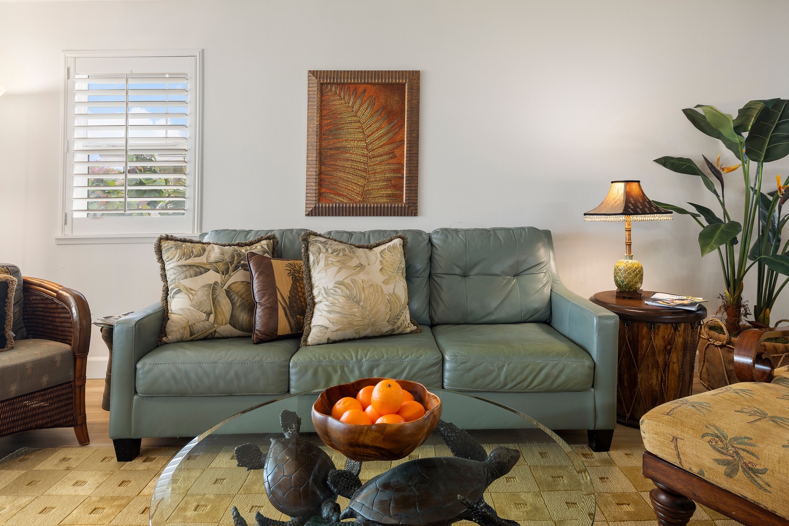 Kapolei Vacation Rentals, Ko Olina Kai 1105E - Unwind in your tropical-inspired living space with plush seating, island-style decor, and natural light filtering through plantation shutters. Relax and feel the warmth of paradise.