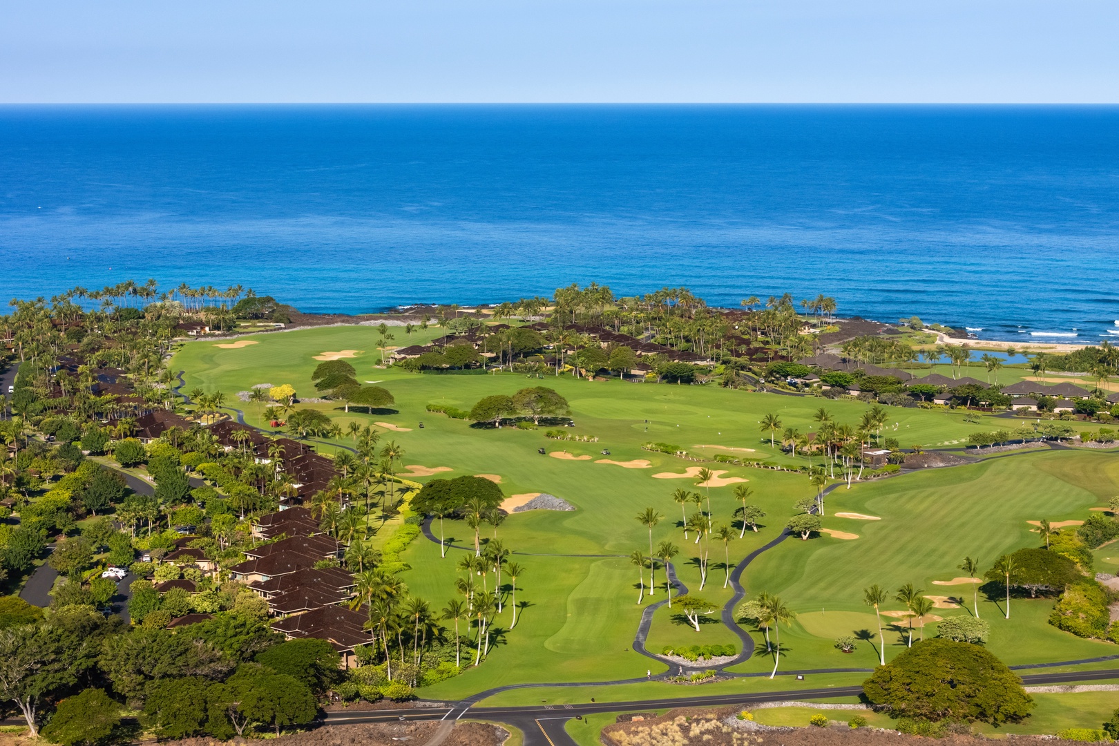 Kailua-Kona Vacation Rentals, 4BD Ka'Ulu Estate (102A) at Hualalai Resort - Spectacular oceanfront golf course with championship greens, palm trees, and pristine fairways stretching to the azure Pacific horizon.