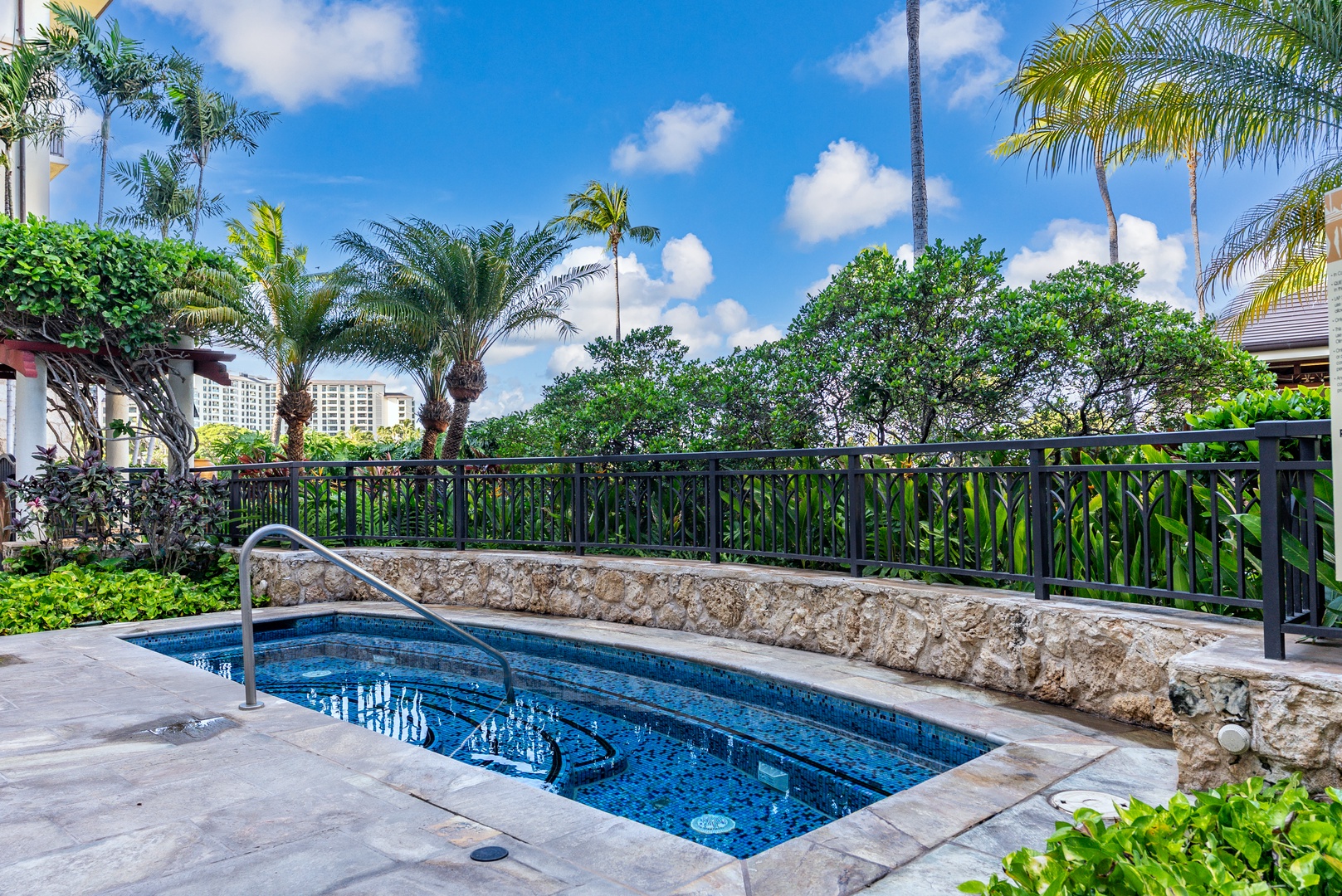 Ease into the curved pool set into the flagstone deck.