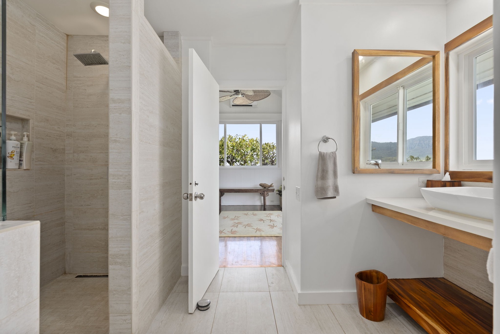 Waianae Vacation Rentals, Ma'ili Blue - Indulge in your shared ensuite retreat with a luxurious rainfall shower and warm wood accents creating the perfect sanctuary.