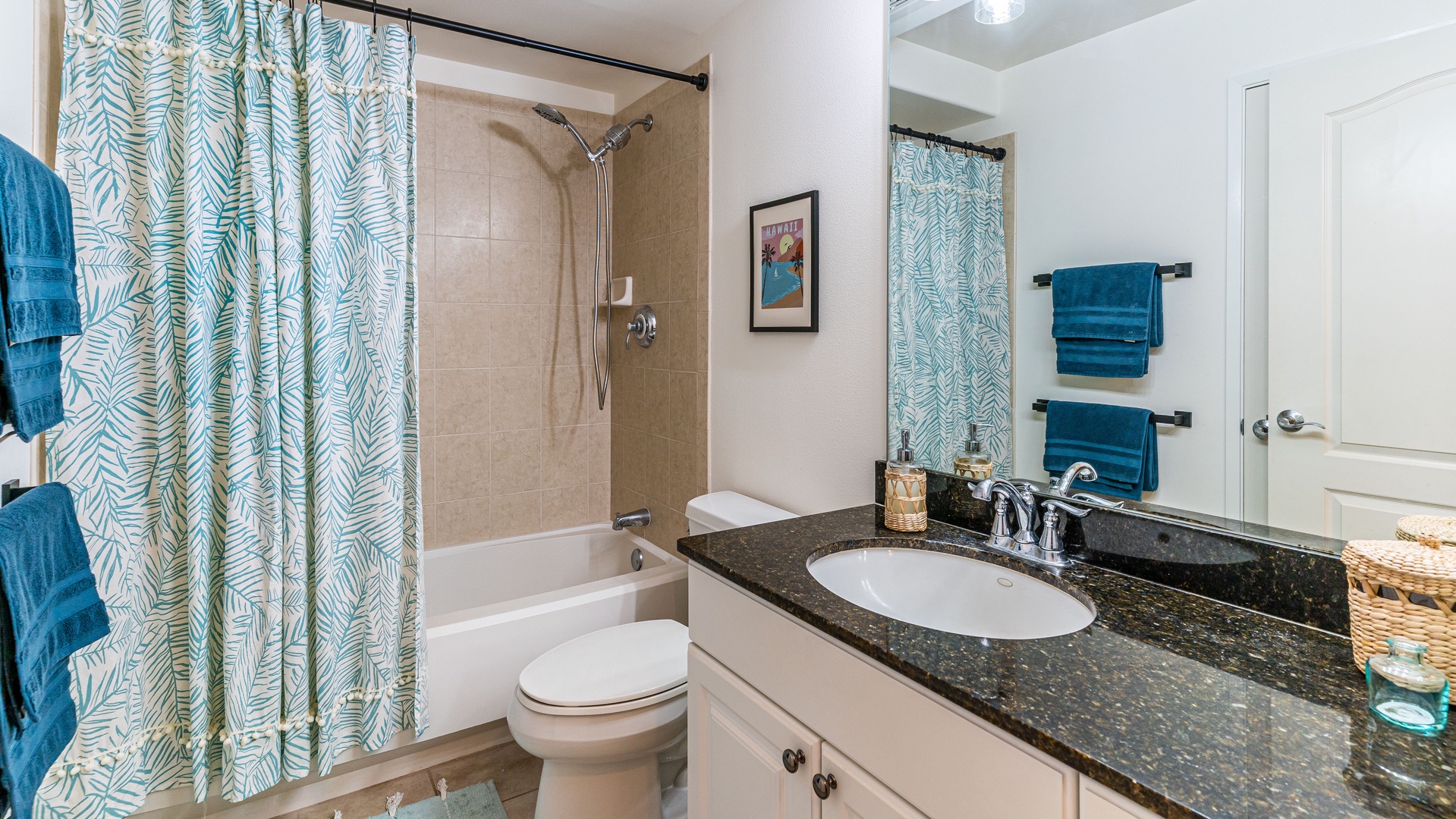 Kapolei Vacation Rentals, Ko Olina Kai 1033A - The second guest bathroom with a shower and tub combo.