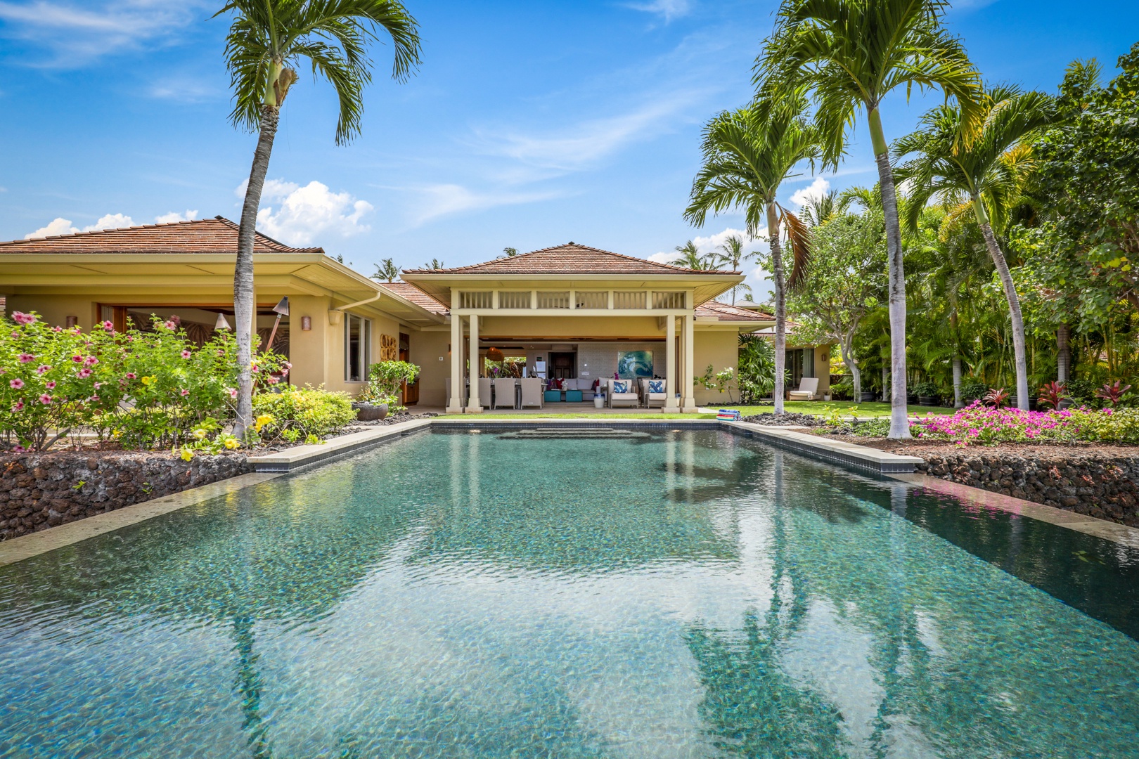 Kailua Kona Vacation Rentals, 4BD Hainoa Estate (122) at Four Seasons Resort at Hualalai - Looking back to the lanai and private yard from the pool.