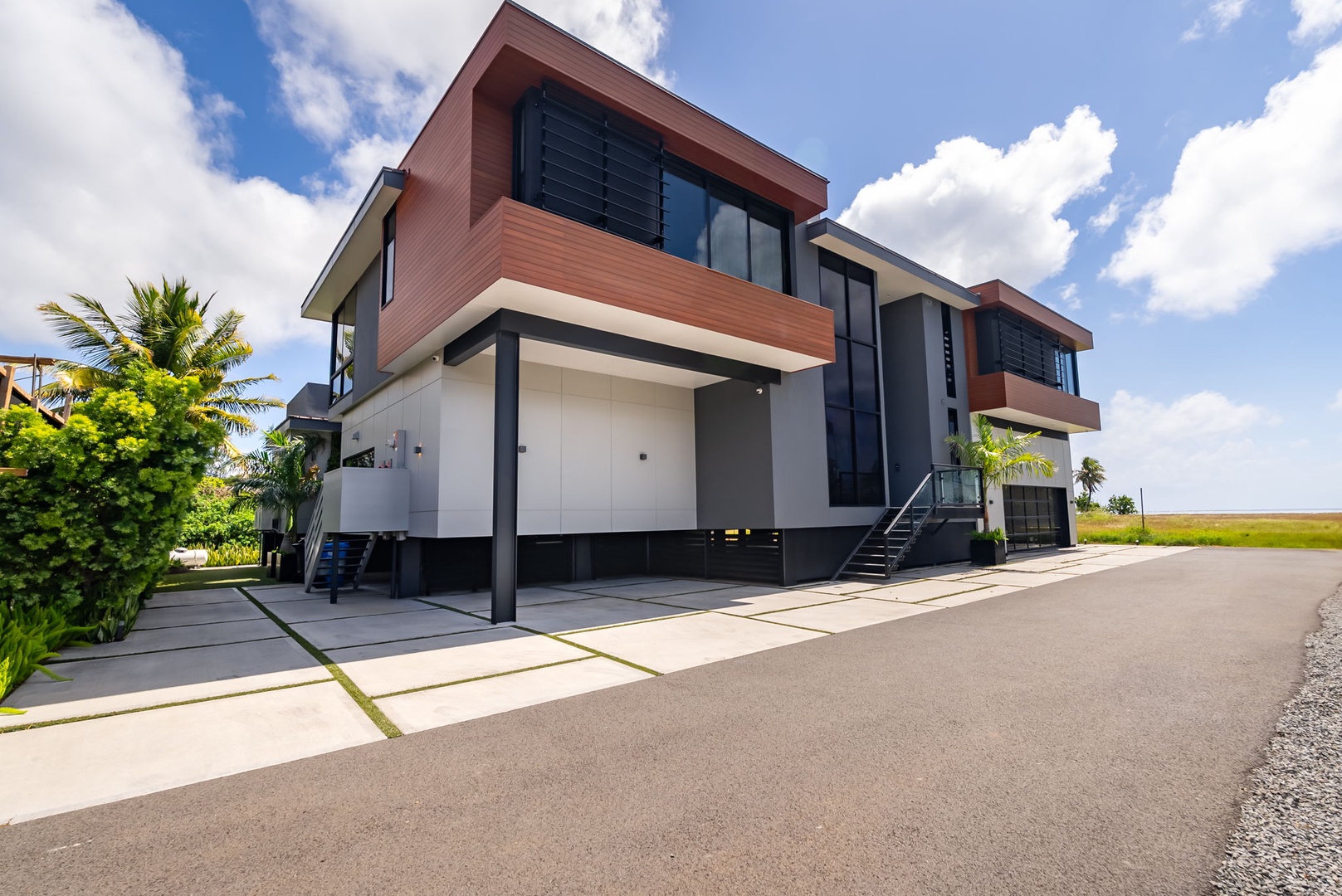Honolulu Vacation Rentals, Ocean Villa Emilie - The villa’s clean lines and striking façade make every return feel like arriving at a private resort.