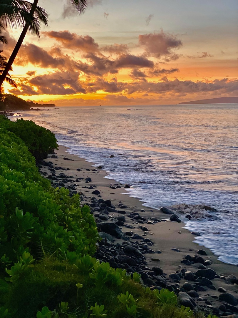 Lahaina Vacation Rentals, Puamana 240-3 - Stroll along the shoreline at dusk, where the golden light meets the sparkling ocean.