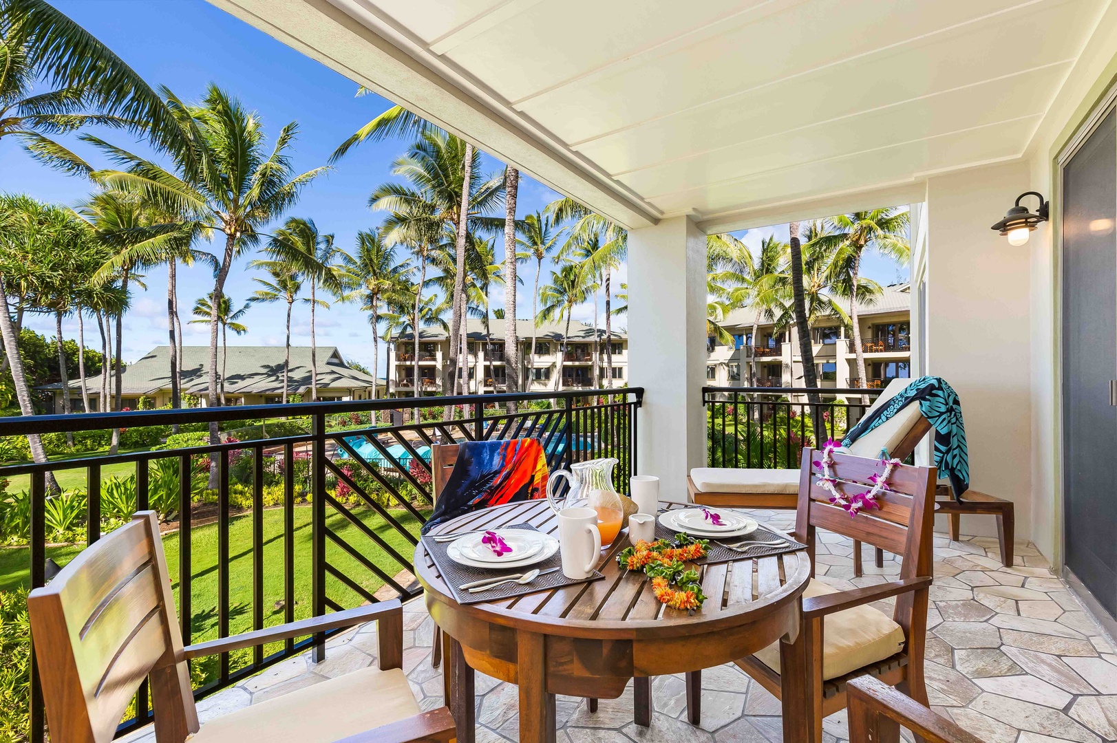 Kahuku Vacation Rentals, Turtle Bay Villas 205/206 - guests may wish to unwind on two lovely, private 158-square foot lanais, which are furnished with a dining table and chaise lounge.