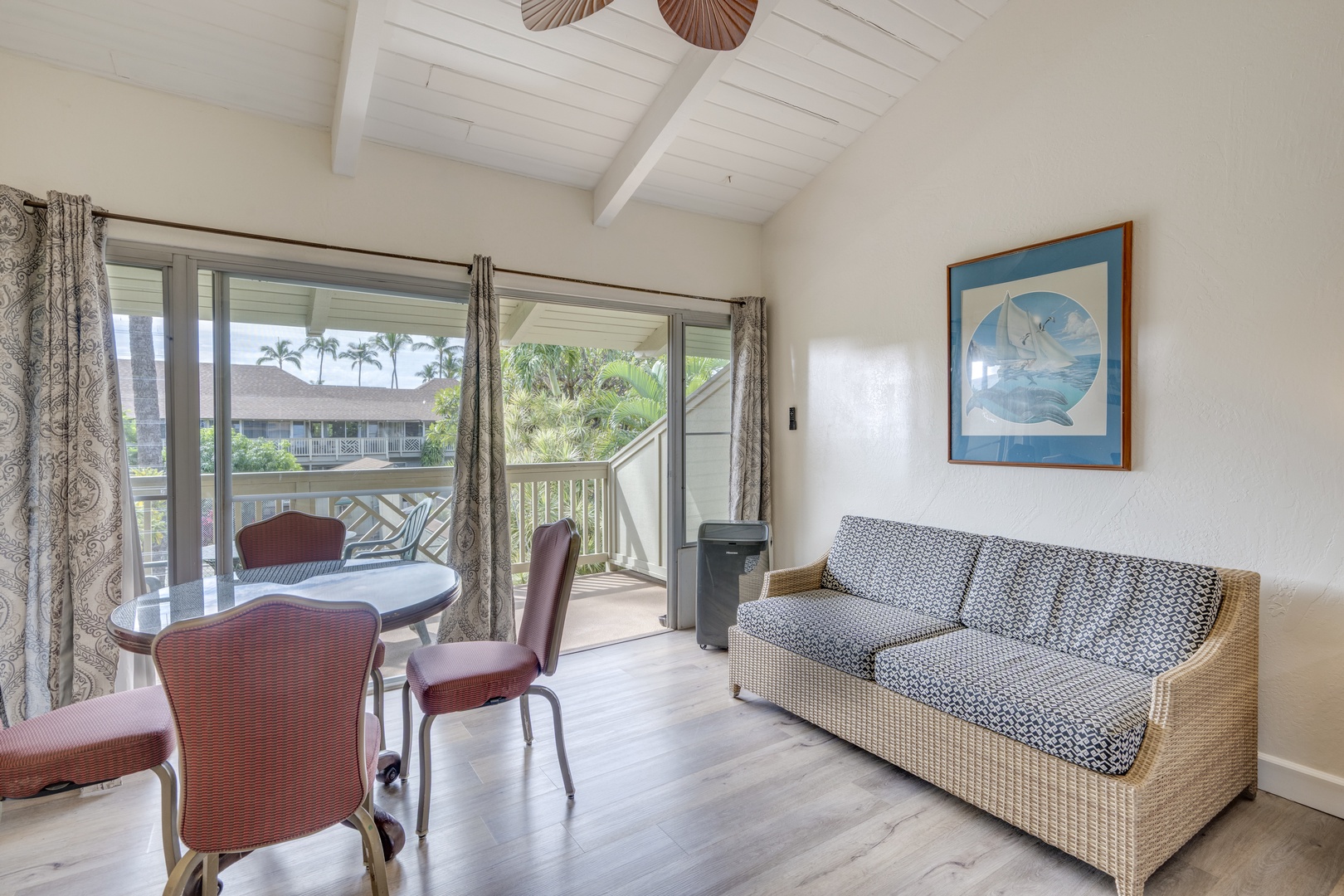 Kihei Vacation Rentals, Kihei Bay Surf B212 - Relax in your bright living space with tropical views through large windows and access to your lanai.