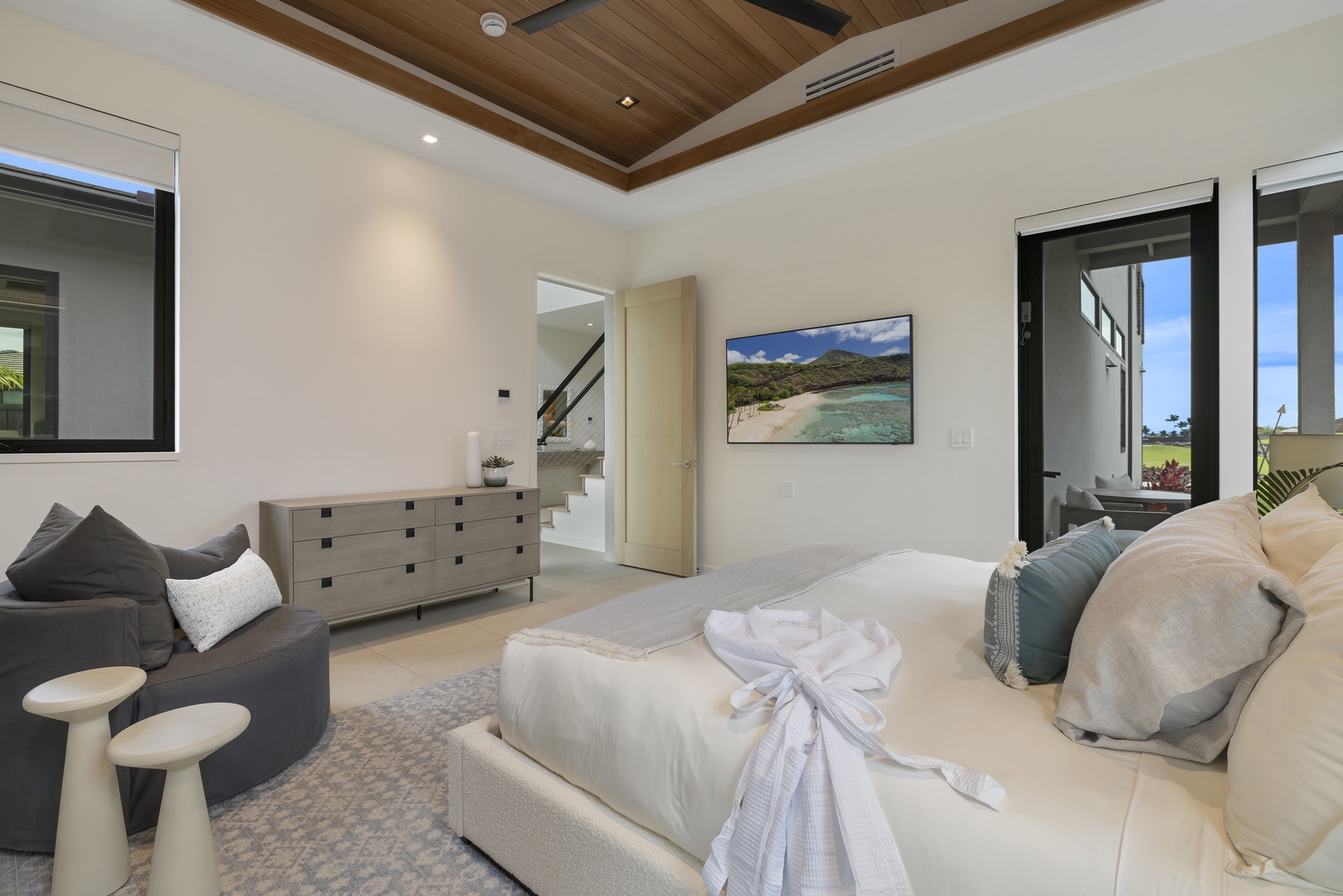 Kamuela Vacation Rentals, 6BD Mauna Lani Lux Golf Estate (6) at One Ocean - Natural light and views of the outdoors enhance this relaxing Guest Suite (Bedroom #3), complete with a sitting area and ample dresser space.