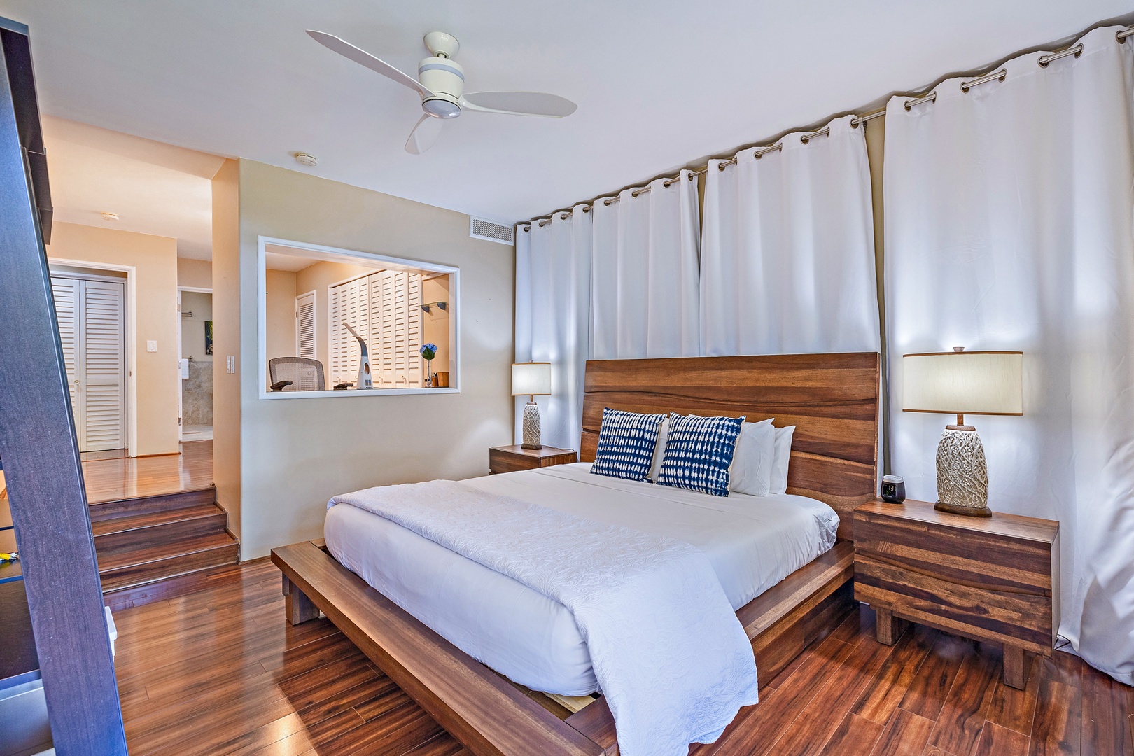 Lahaina Vacation Rentals, Kaanapali Royal Q-202 - The primary suite has central AC, desk, king-sized bed and ceiling fan.