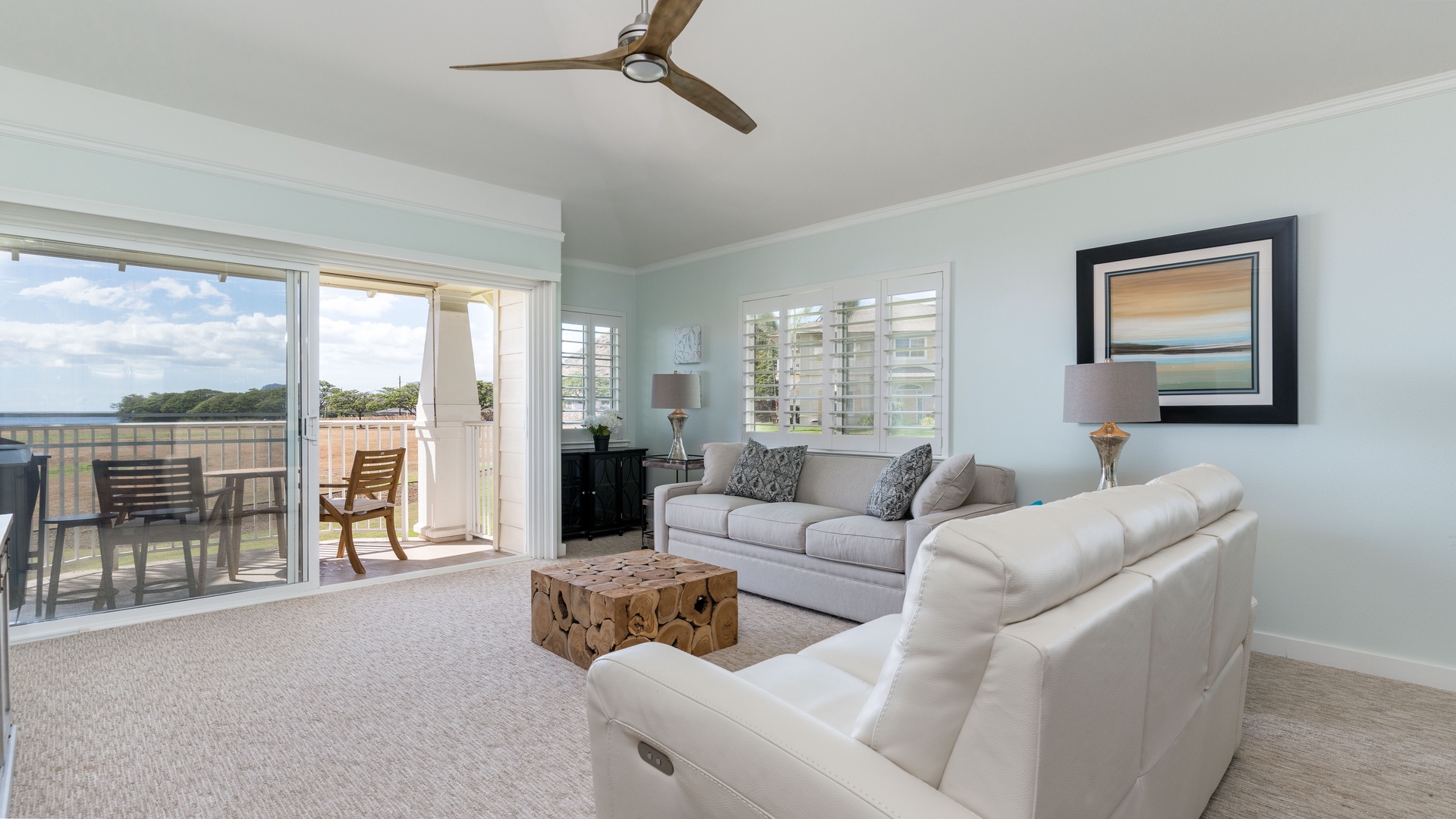 Kapolei Vacation Rentals, Kai Lani 21C - Seamless living in the beautifully furnished living room with a peaceful view.