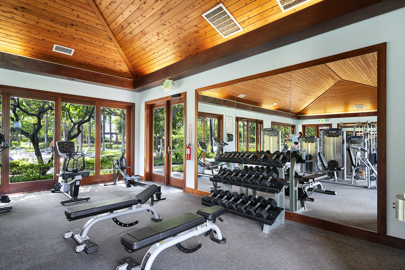 Kamuela Vacation Rentals, Mauna Lani KaMilo #503 - Keep your wellness routine on track with the community’s bright and airy fitness center—offering everything from free weights to cardio equipment, all with serene garden views.
