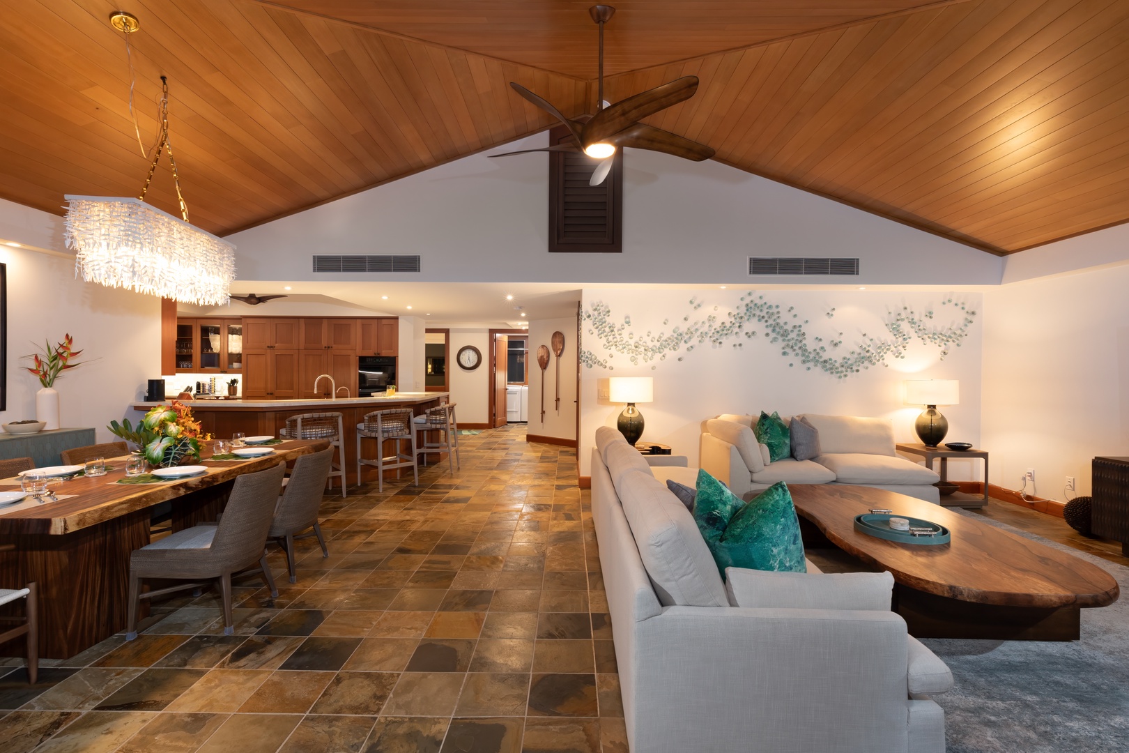 Kailua Kona Vacation Rentals, 3BD Waiulu Villa 111D at Hualalai Resort - Open-concept living and dining area with vaulted ceilings and stylish decor.