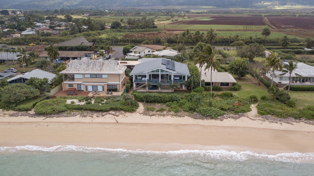 Waialua Vacation Rentals, Sea of Glass* - Aerial shot of beachfront Sea of Glass property and surrounding neighborhood