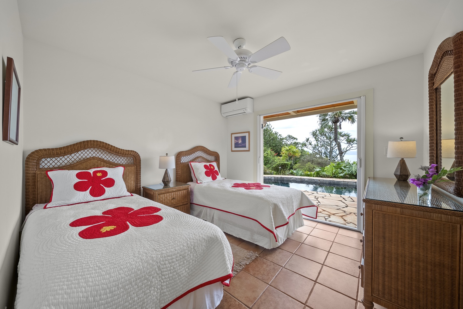 Haleiwa Vacation Rentals, Ka Hale Hau'oli - Wake up to tropical paradise in your twin bedroom with stunning pool views and charming hibiscus-themed bedding.