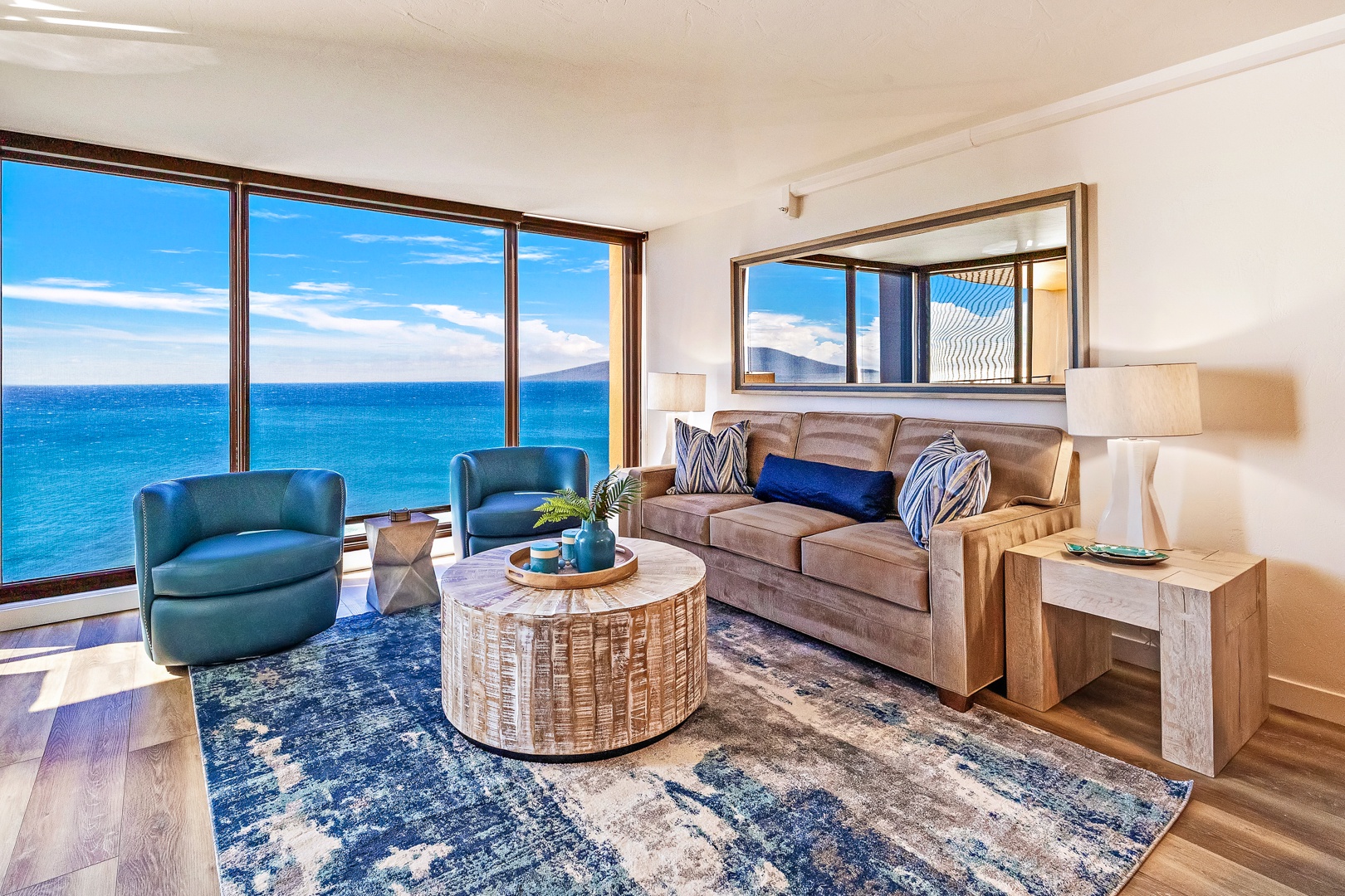 Lahaina Vacation Rentals, Mahana 1118 - This bright and inviting living area features floor-to-ceiling windows with stunning ocean views.