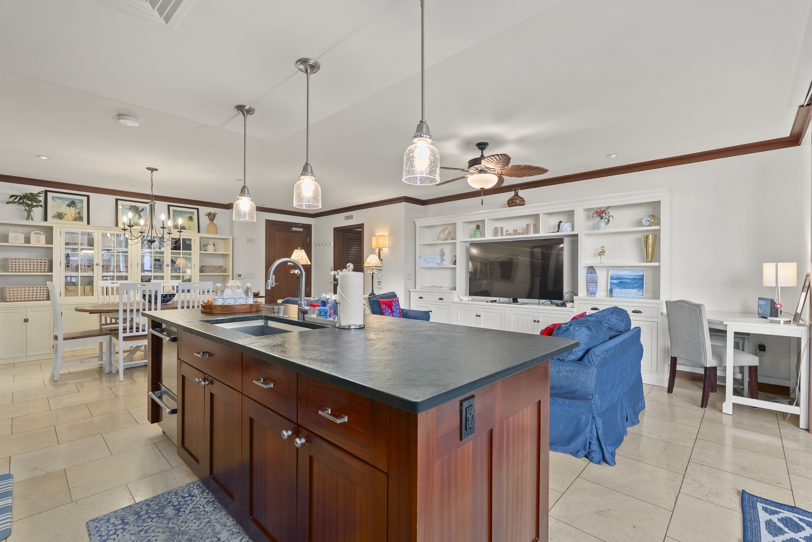 Kapolei Vacation Rentals, Ko Olina Beach Villas O211 - Prep at the island sink with the living room in full view, everyone in one space.