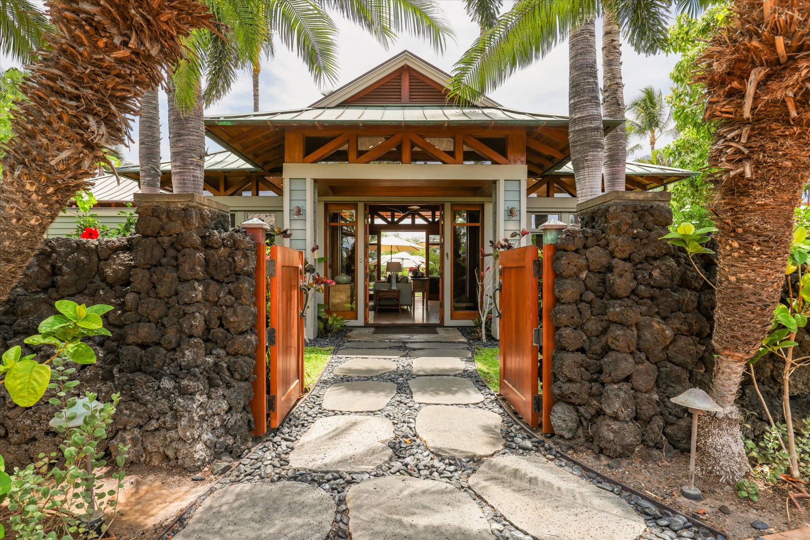 Kamuela Vacation Rentals, 3BD Na Hale 3 at Pauoa Beach Club at Mauna Lani Resort - Arrive through the lava-rock gate and the stone path that leads to the front door.