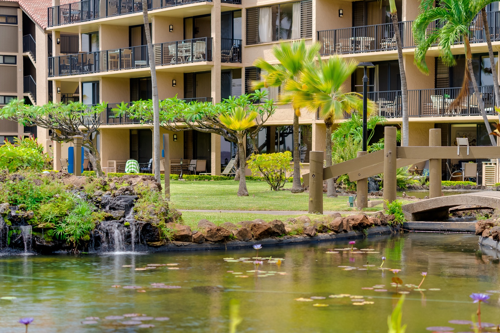 Lahaina Vacation Rentals, Papakea K-105 - Discover a peaceful pond surrounded by tropical blooms at Papakea K-105.