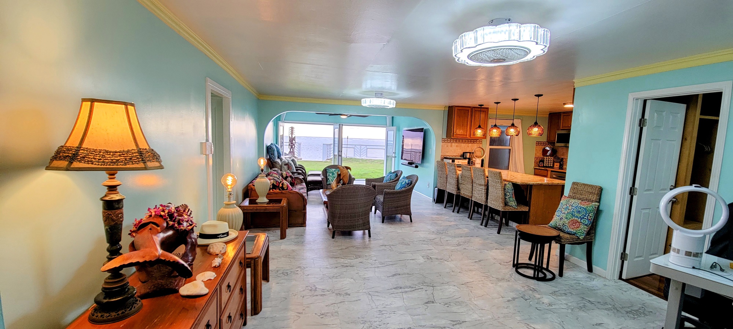 Hauula Vacation Rentals, Paradise Reef Retreat - Experience ultimate entertainment in the living area, boasting an 80-inch 8K QLED TV and an immersive 11.1 surround sound system.