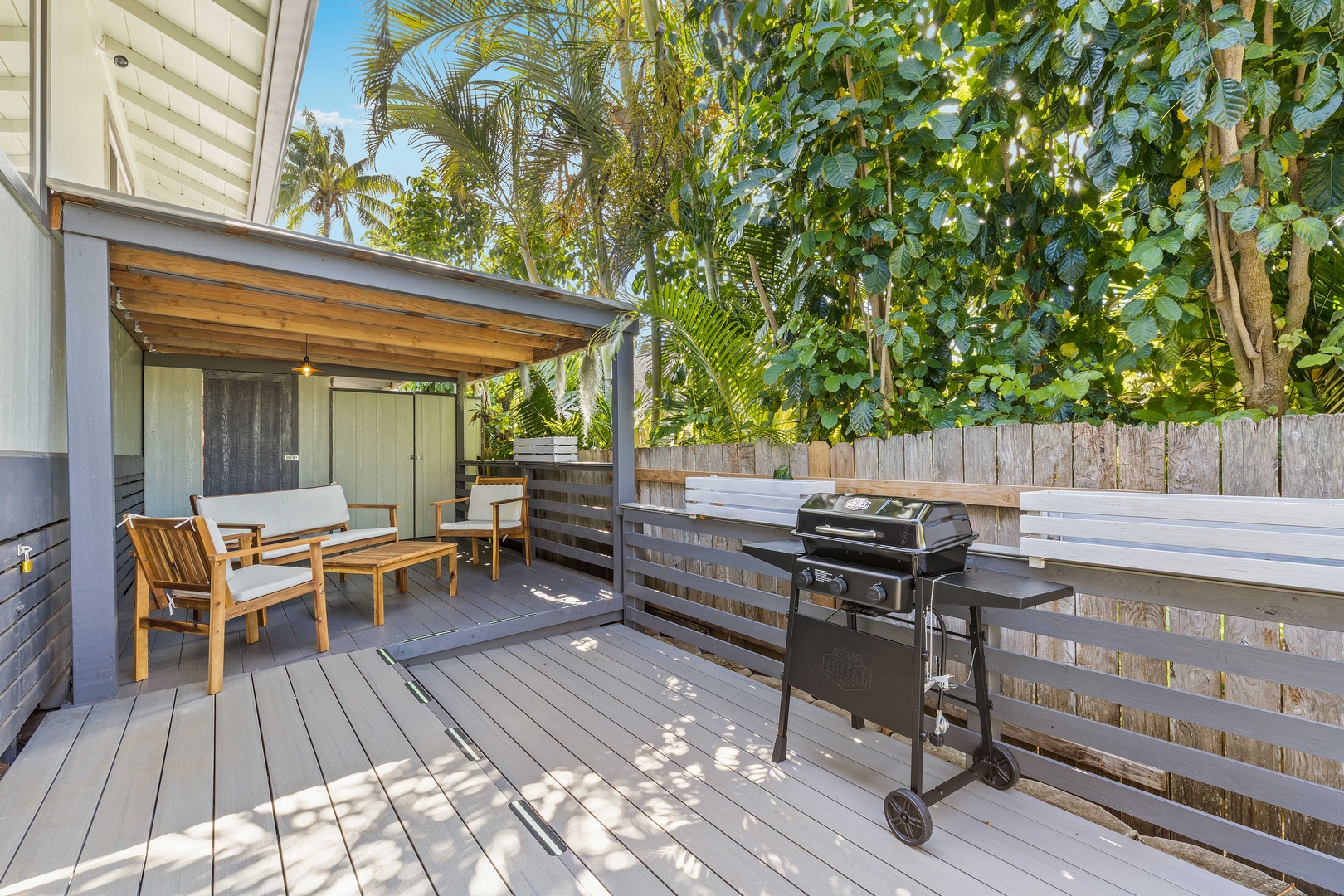 Haleiwa Vacation Rentals, Velzey Ohana Villa (4B Vacation Home) - Grill out and dine al fresco on your private deck surrounded by lush tropical greenery.