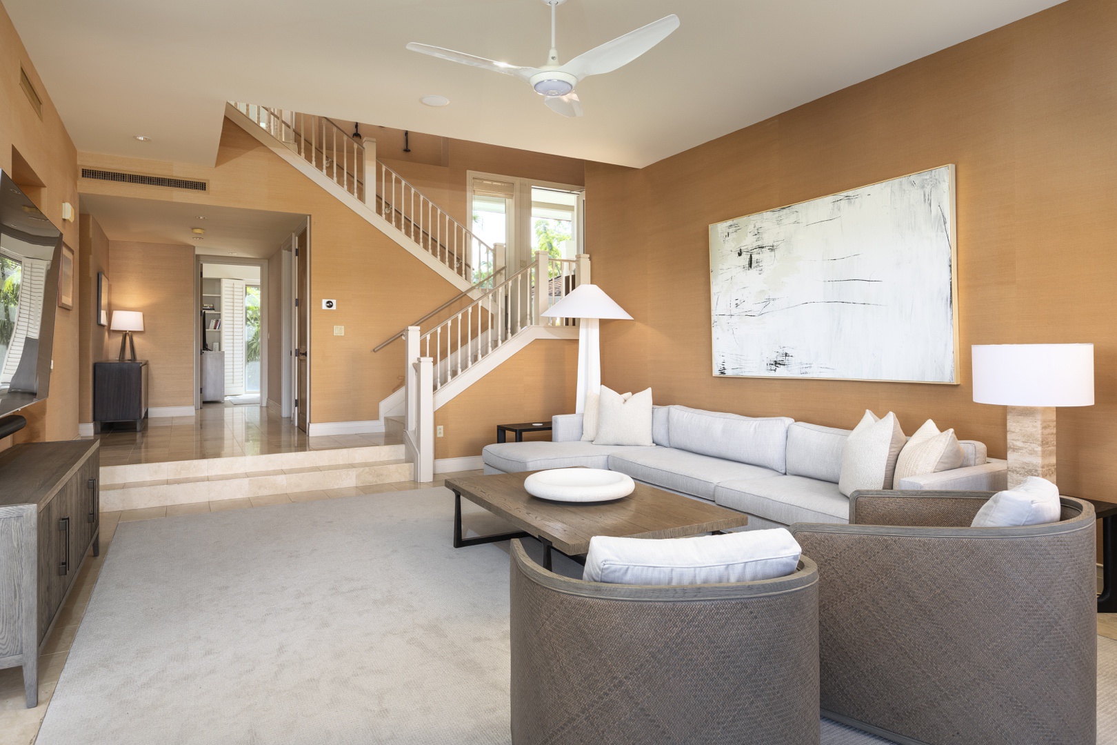Kailua Kona Vacation Rentals, 3BD Palm Villa (130B) at Hualalai Resort - Dedicated media room with 75” smart wall-mounted TV, wet bar and staircase to upper level