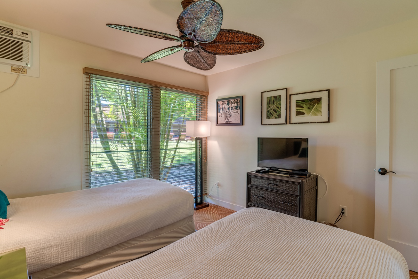 Lahaina Vacation Rentals, Aina Nalu D103 - This bedroom is also equipped with a flat screen TV, ceiling fan, and window A/C to keep you cool and comfortable