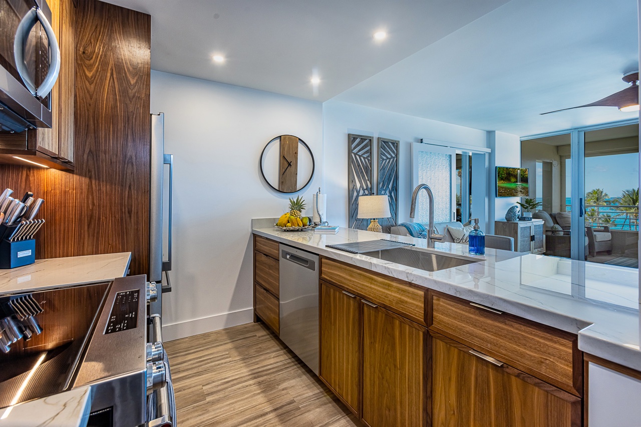 Kihei Vacation Rentals, Kamaole Beach Royal 610 - A built-in dishwasher and marble counters mean cleanup takes minutes, not the evening.