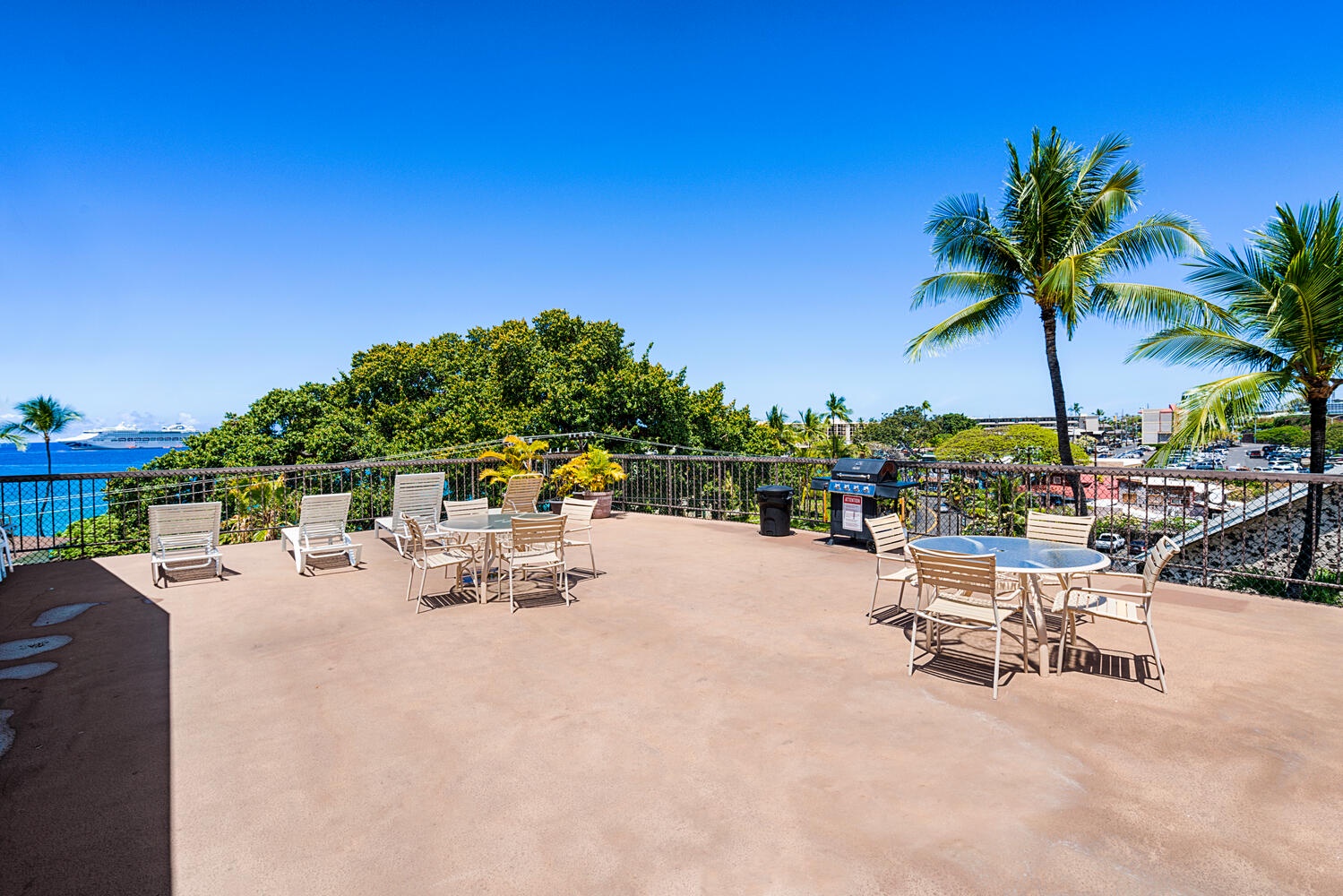 Kailua Kona Vacation Rentals, Kona Plaza 201 - Breathe in the ocean breeze, where tropical views and comfortable seating create the perfect island retreat.