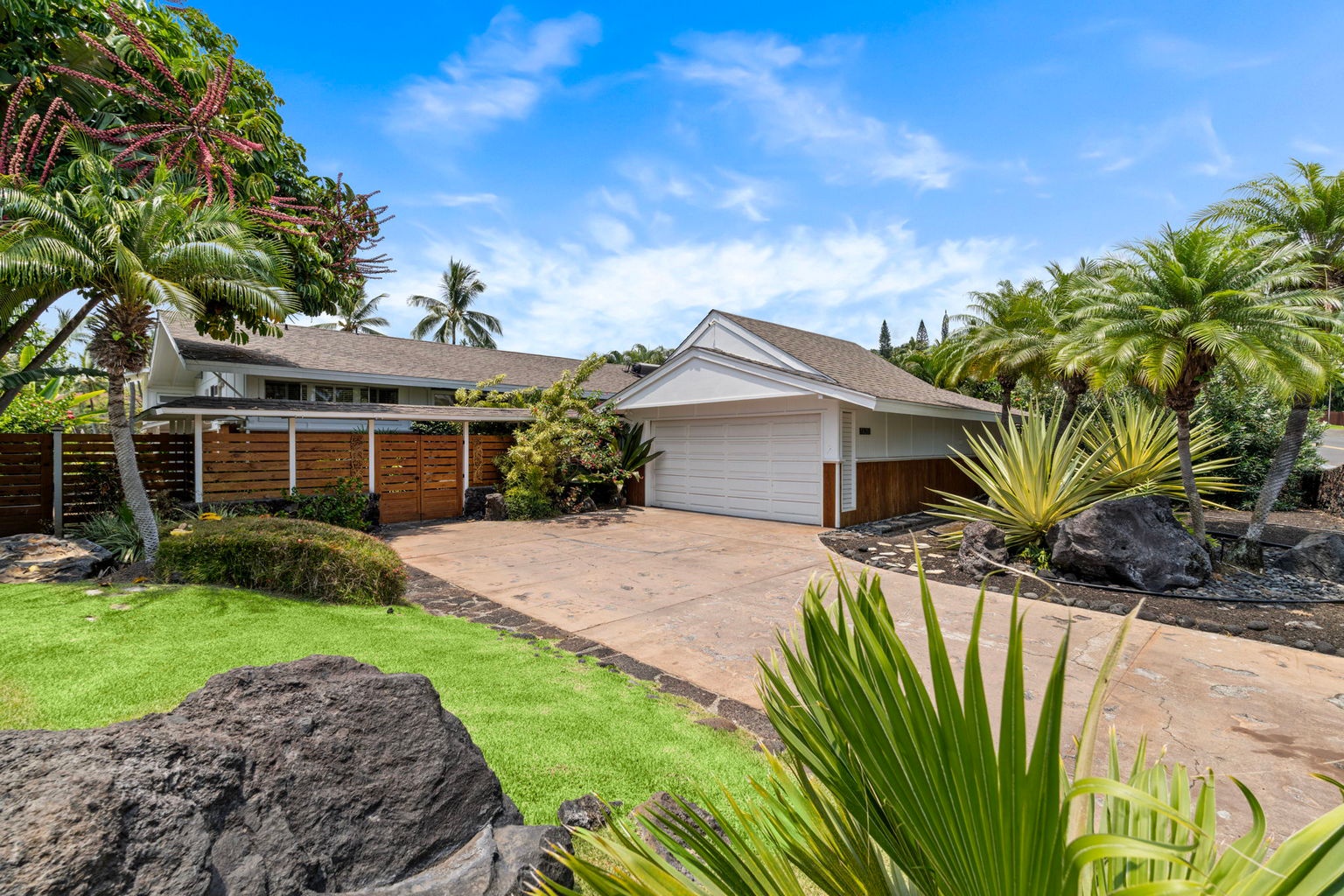Kailua Kona Vacation Rentals, Manukai Hale - An aerial angle shows the home and yard tucked into the surrounding greenery.