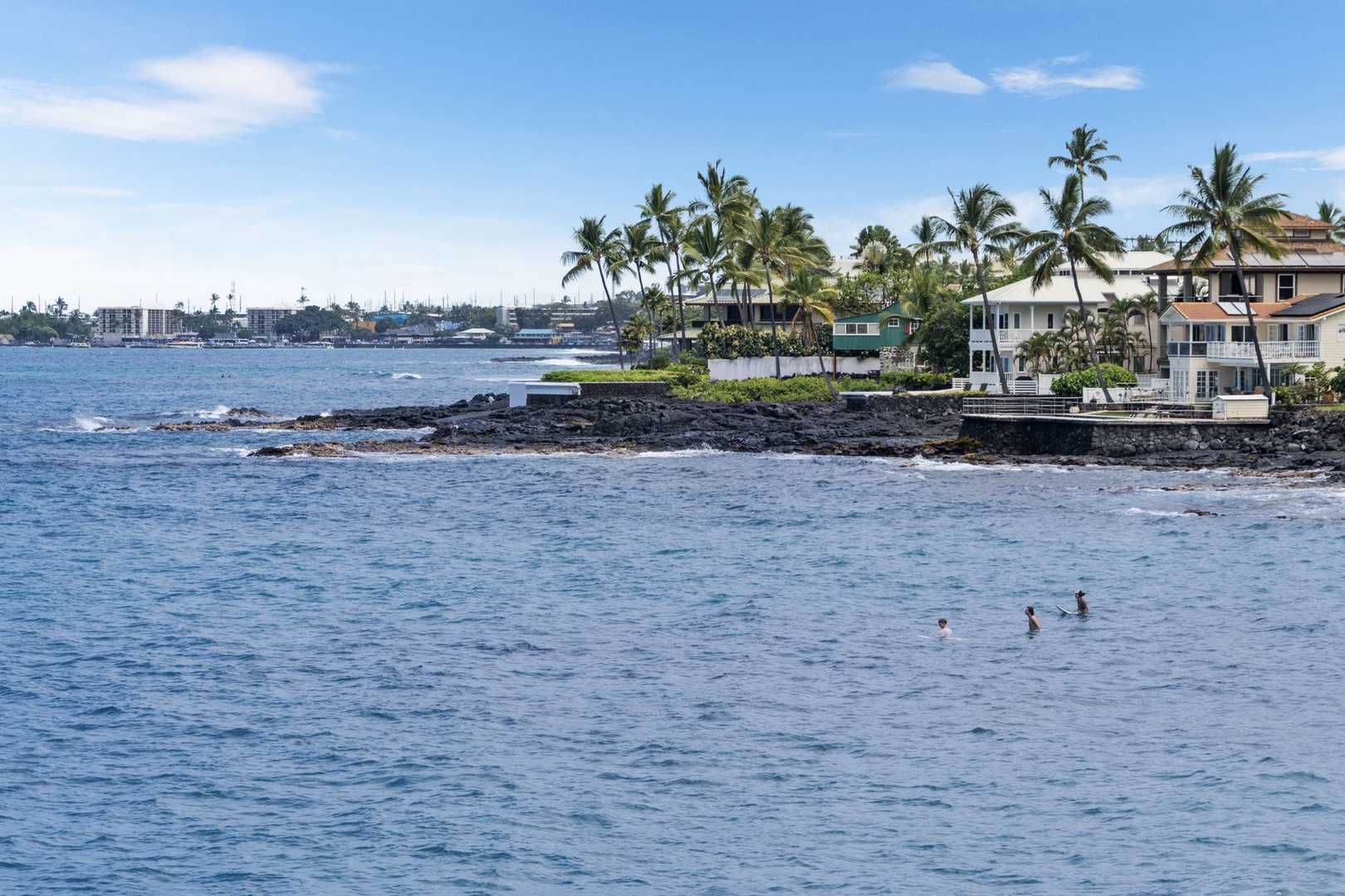 Kailua Kona Vacation Rentals, Sea Village 1105 - Steps from the shoreline, you’ll often spot turtles, dolphins, and paddlers in the bay.