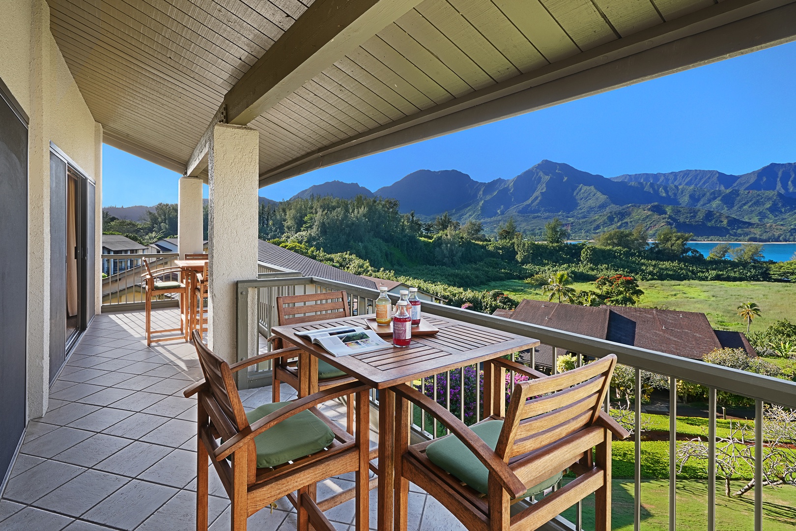 Princeville Vacation Rentals, Hanalei Bay Resort 4302/3 - Enjoy alfresco dining with stunning scenery from the private lanai.