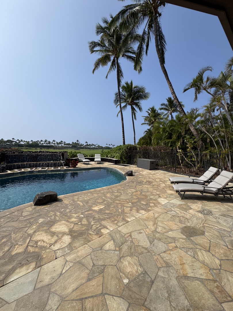 Kamuela Vacation Rentals, Hale Konane - Relax by the private pool surrounded by lush greenery and swaying palm trees.