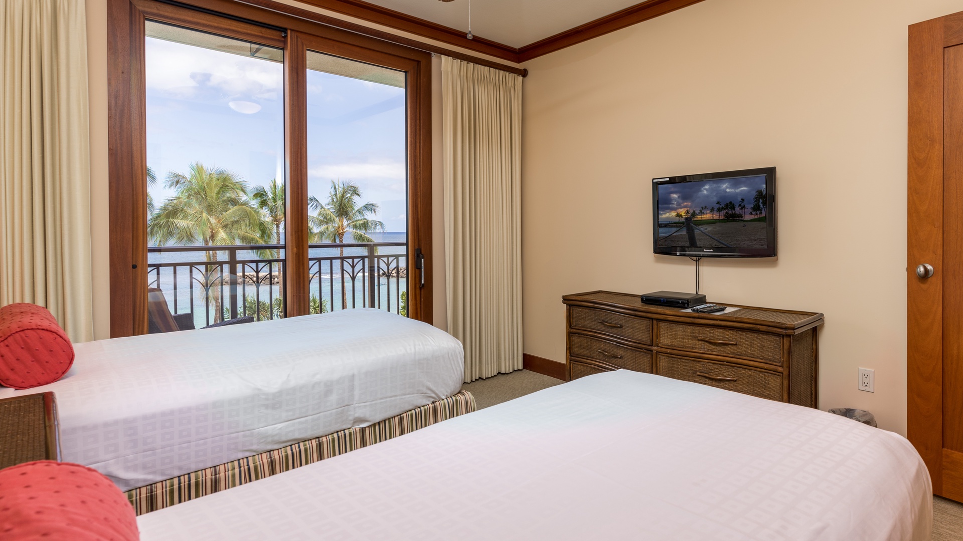 Kapolei Vacation Rentals, Ko Olina Beach Villas B310 - The spacious second guest bedroom with TV and a dresser.