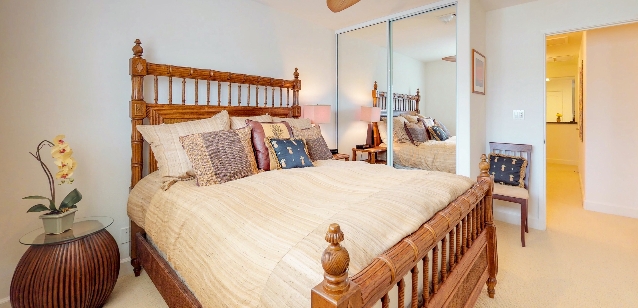 Kapolei Vacation Rentals, Ko Olina Kai 1105E - Guest bedroom features large bed and a mirror closet.