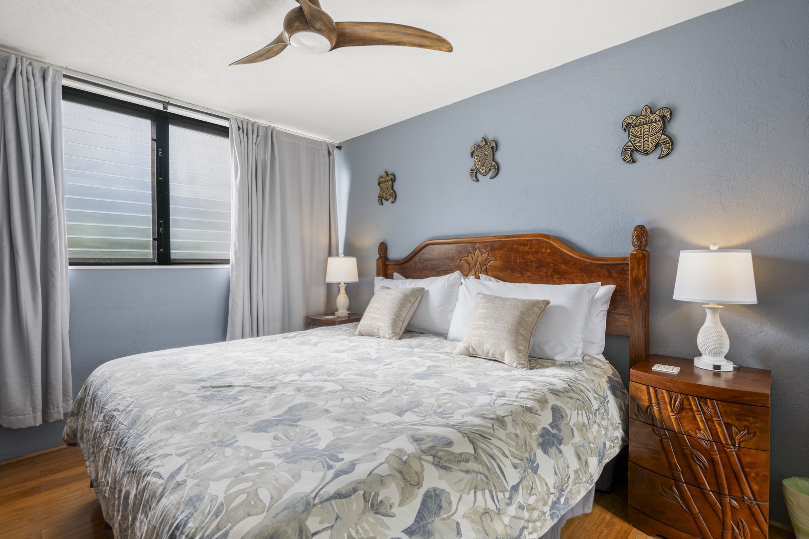 Lahaina Vacation Rentals, Polynesian Shores 114 - The primary bedroom keeps it simple with a king bed and room to actually rest.
