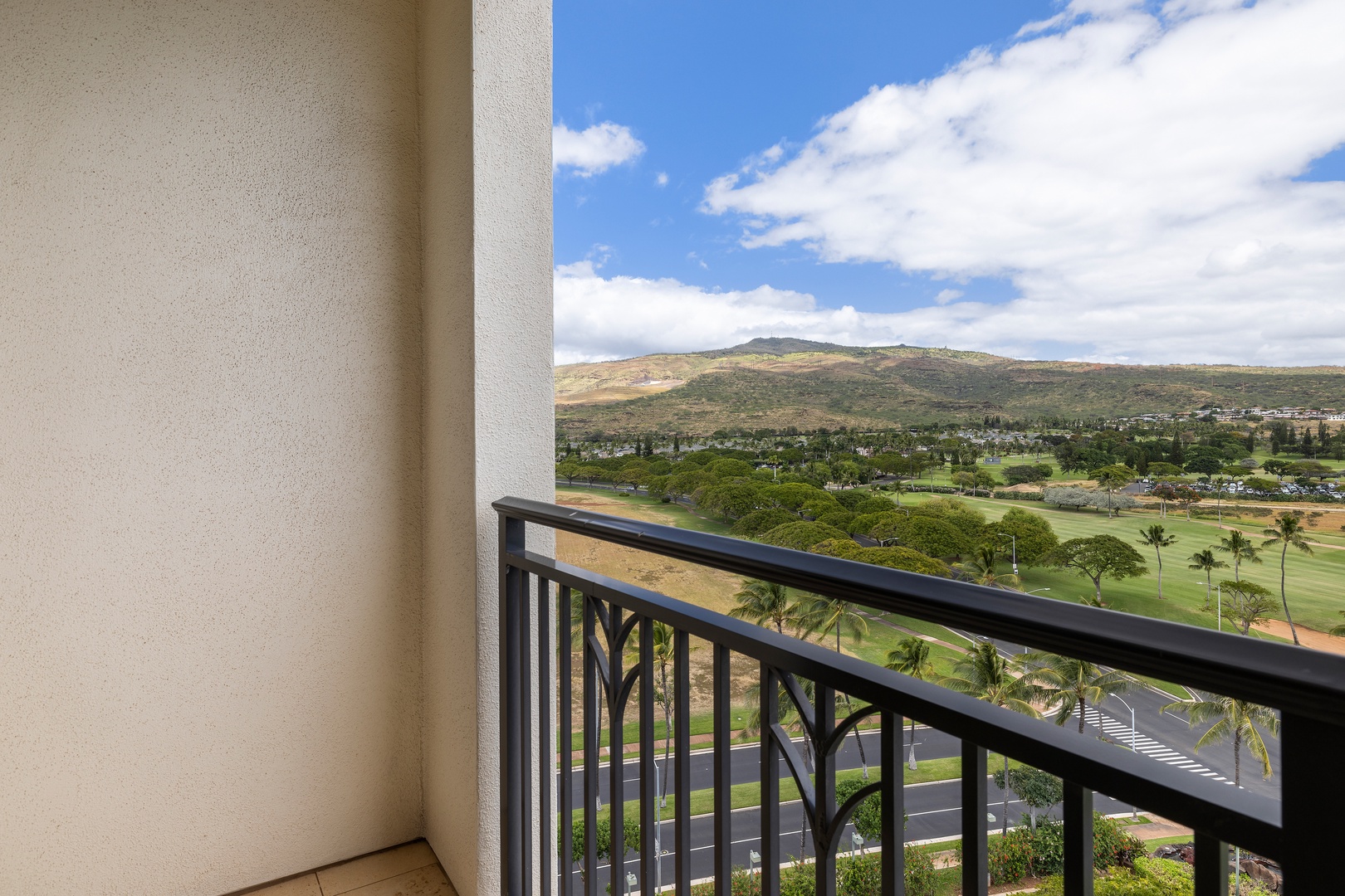 Kapolei Vacation Rentals, Ko Olina Beach Villas O1001 - Enjoy the view from the primary bedroom's private lanai.